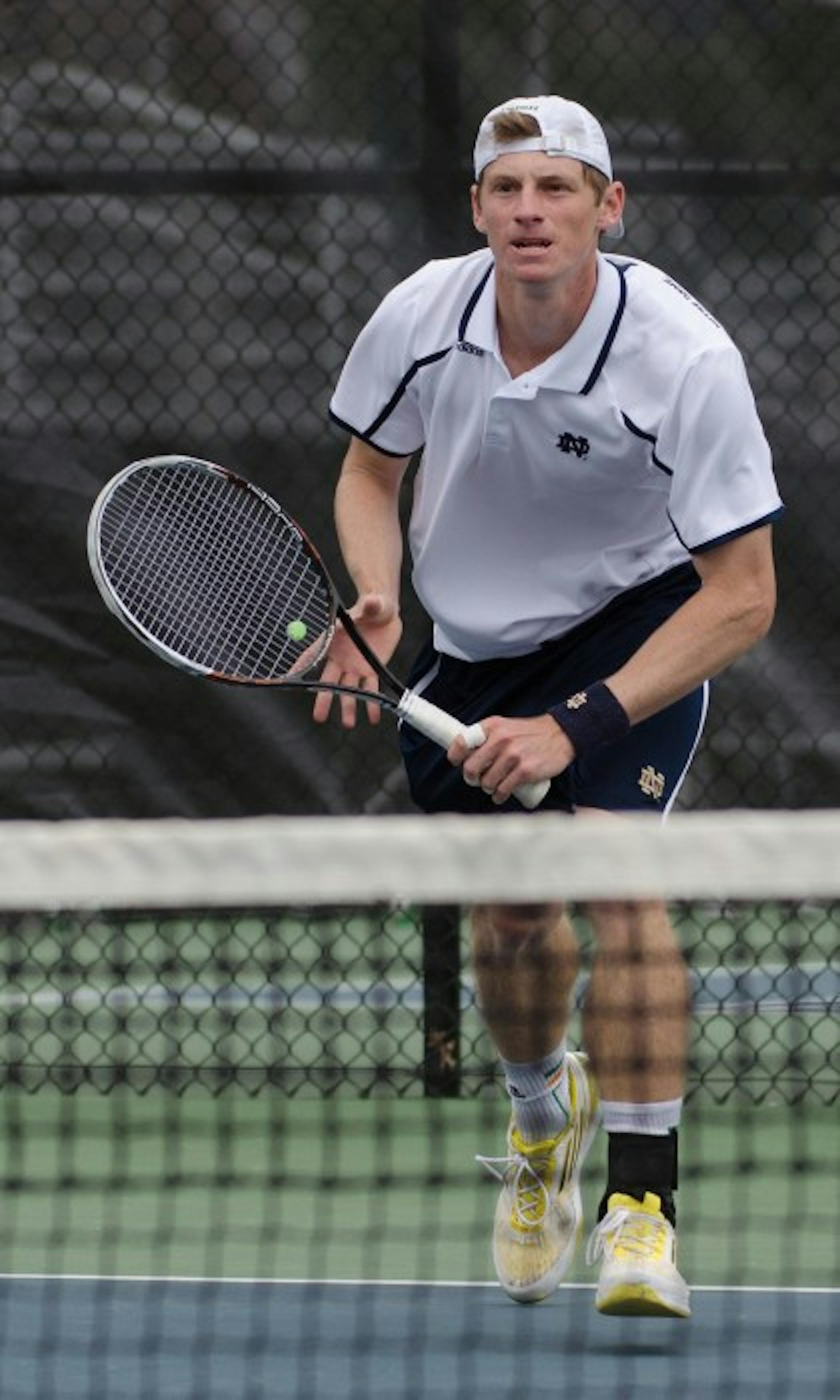 Junior Alex Lawson moves toward the ball in a 6-1 win over Florida State on April 13 at the Eck Tennis Pavilion.