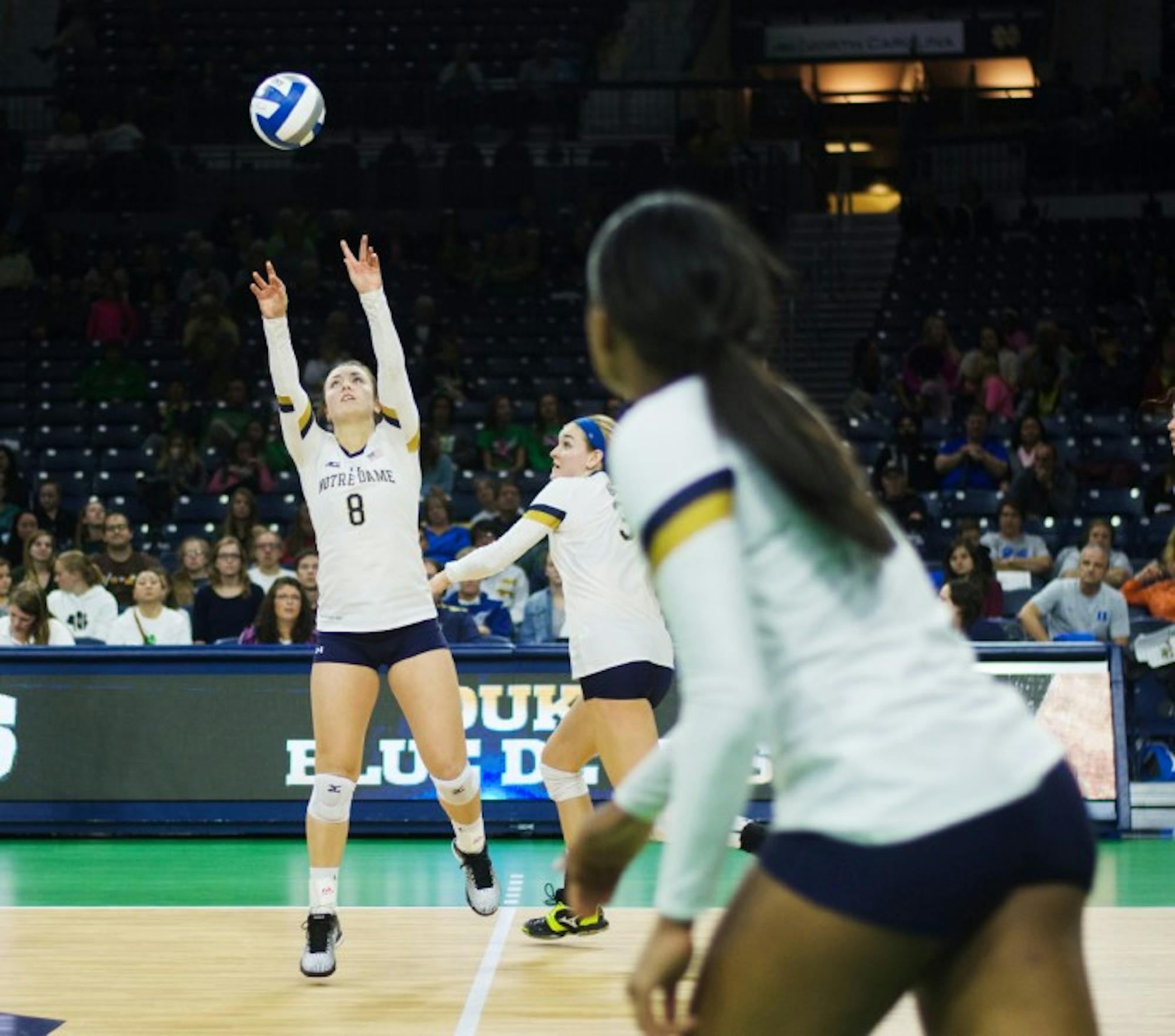 Irish junior setter Caroline Holt sets up a spike during Notre Dame’s 3-1 win over Duke on Sept. 30 at  Purcell Pavilion. Holt has 834 assists so far this season, and she is averaging nearly 11 assists per set.