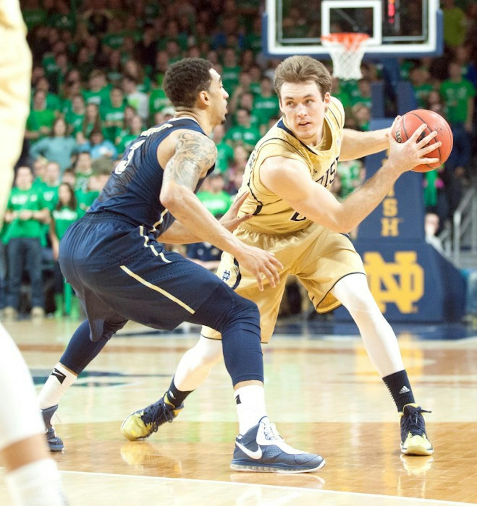 Irish senior/guard forward Pat Connaughton fakes out a Panther defender during Notre Dame's 85-81 loss to Pittsburgh on March 3.