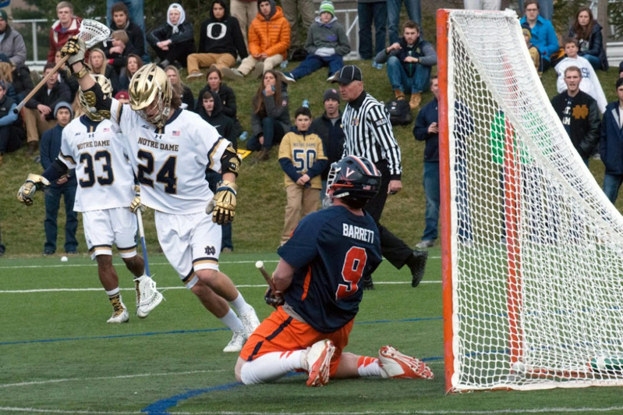 Notre Dame sophomore attack Mikey Wynne celebrates after scoring a goal in ND’s 8-7 overtime win over Virginia on March 19.