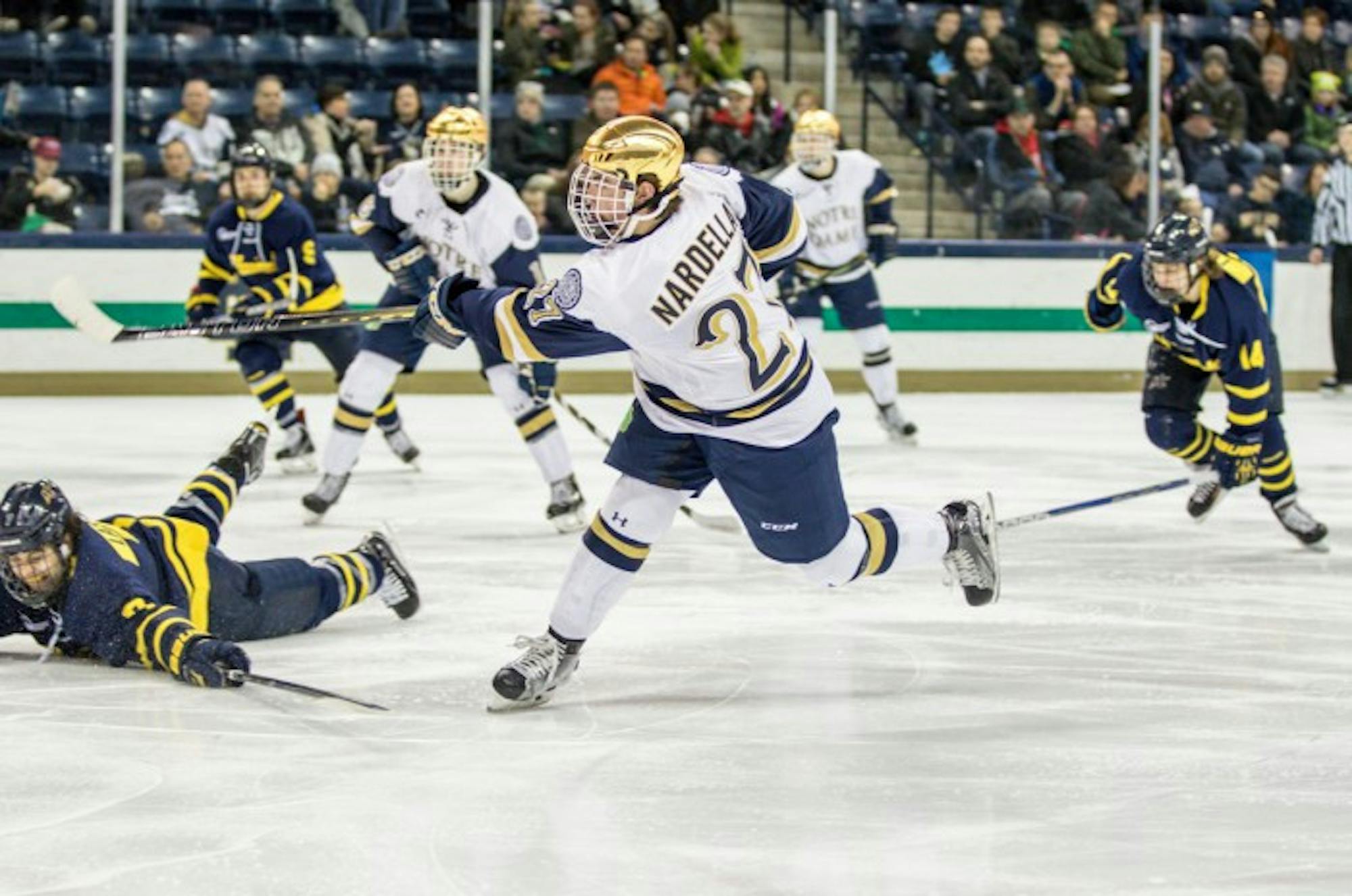 Irish freshman defenseman Bobby Nardella takes a shot during Notre Dame’s 7-2 victory over Merrimack at Compton Family Ice Arena. Nardella is currently riding a seven-game point streak.