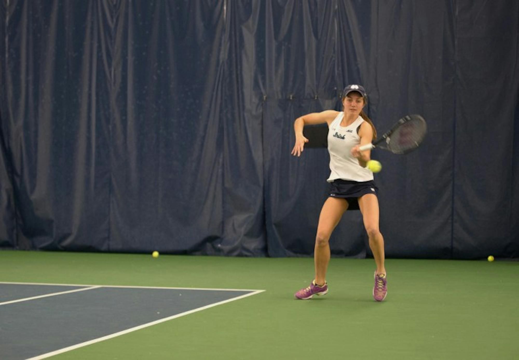 Irish junior Mary Closs fires a forehand during Notre Dame’s 6-1 loss to Stanford on Feb. 6 at Eck Tennis Pavilion.