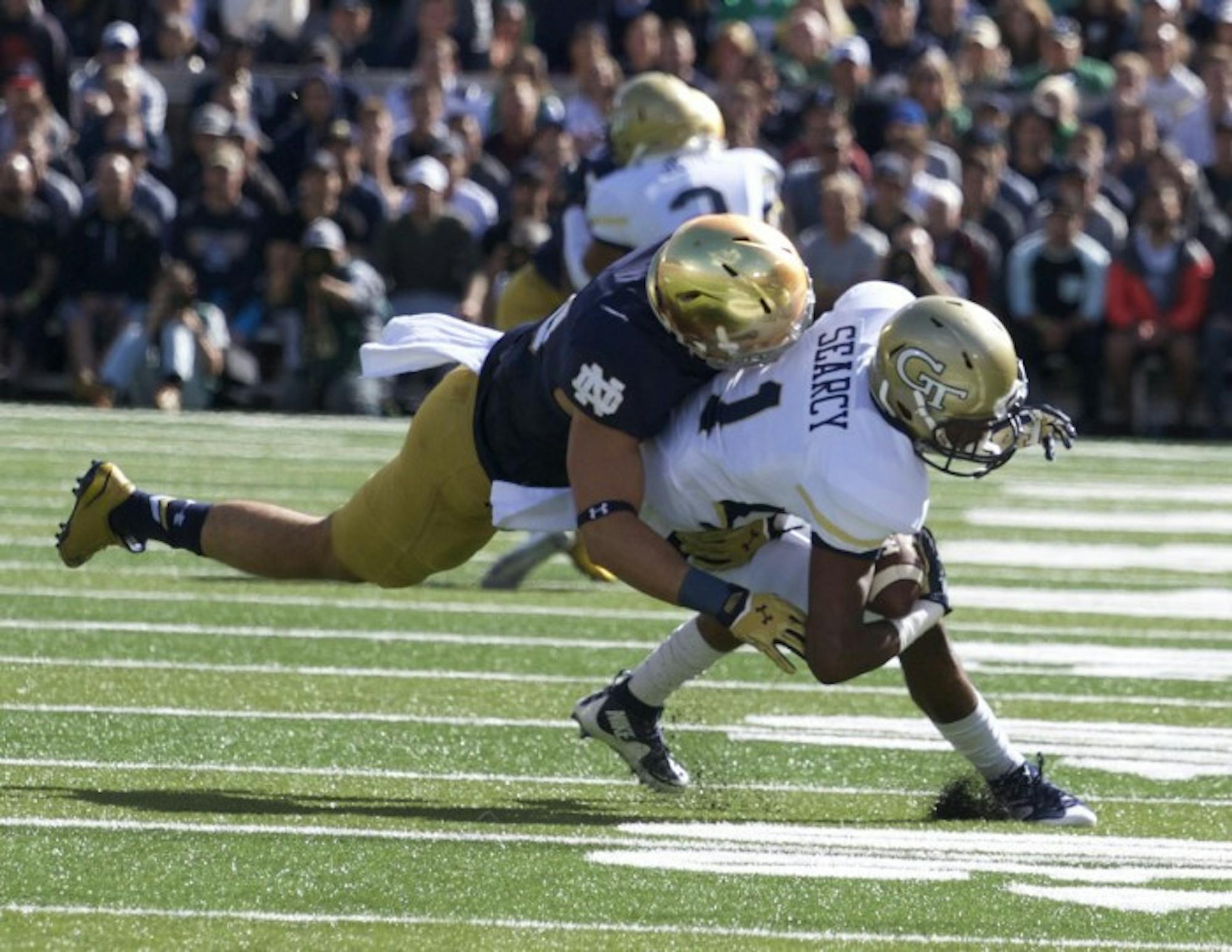 Sophomore safety Drue Tranquill  makes a tackle in a 30-22  win against Georgia Tech on Saturday at Notre Dame Stadium.