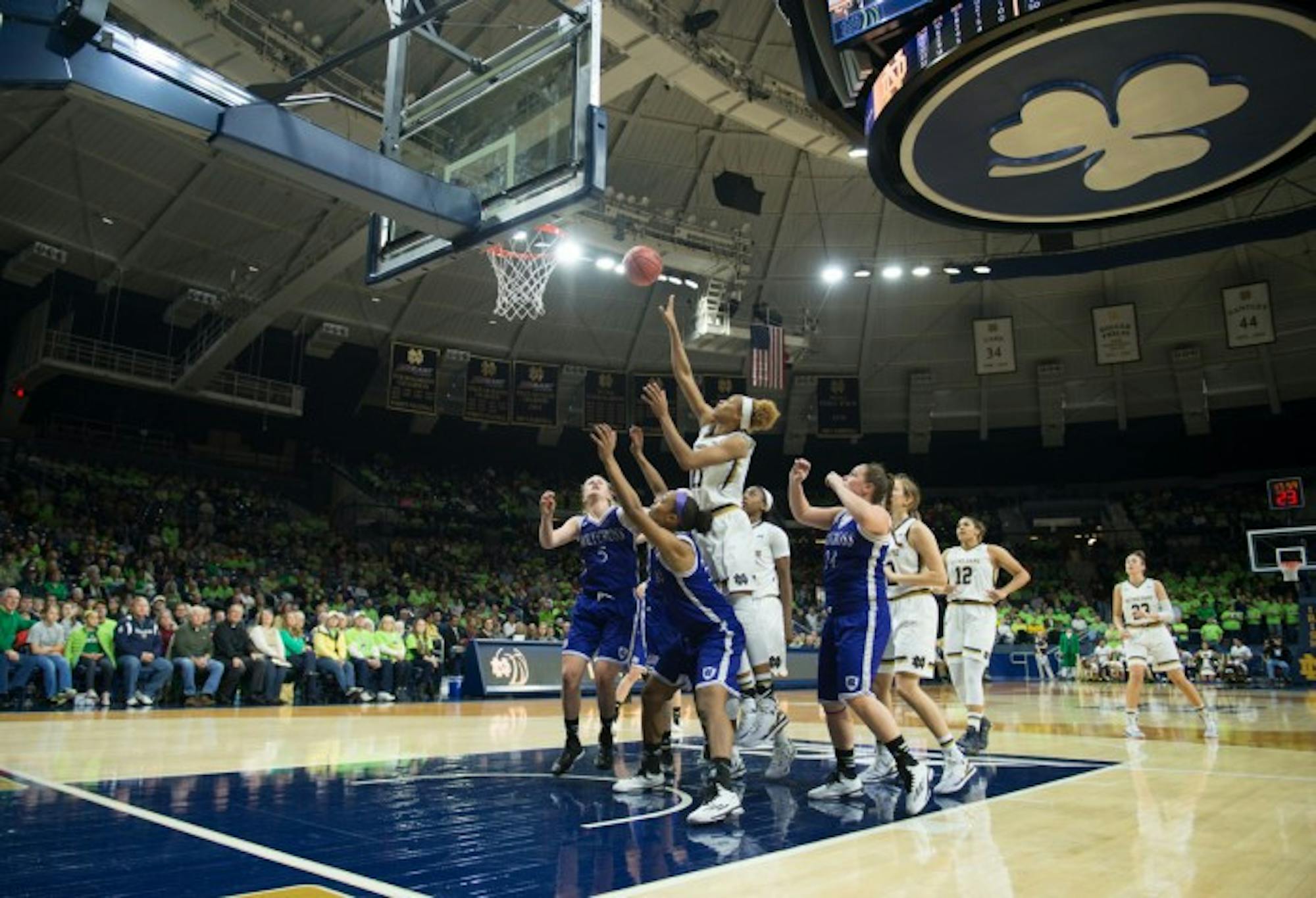 Notre Dame freshman forward Brianna Turner jumps for a rebound during a 104-29 rout of Holy Cross on Nov. 23. Turner has won several awards this season, including five ACC Freshman of the Week honors.