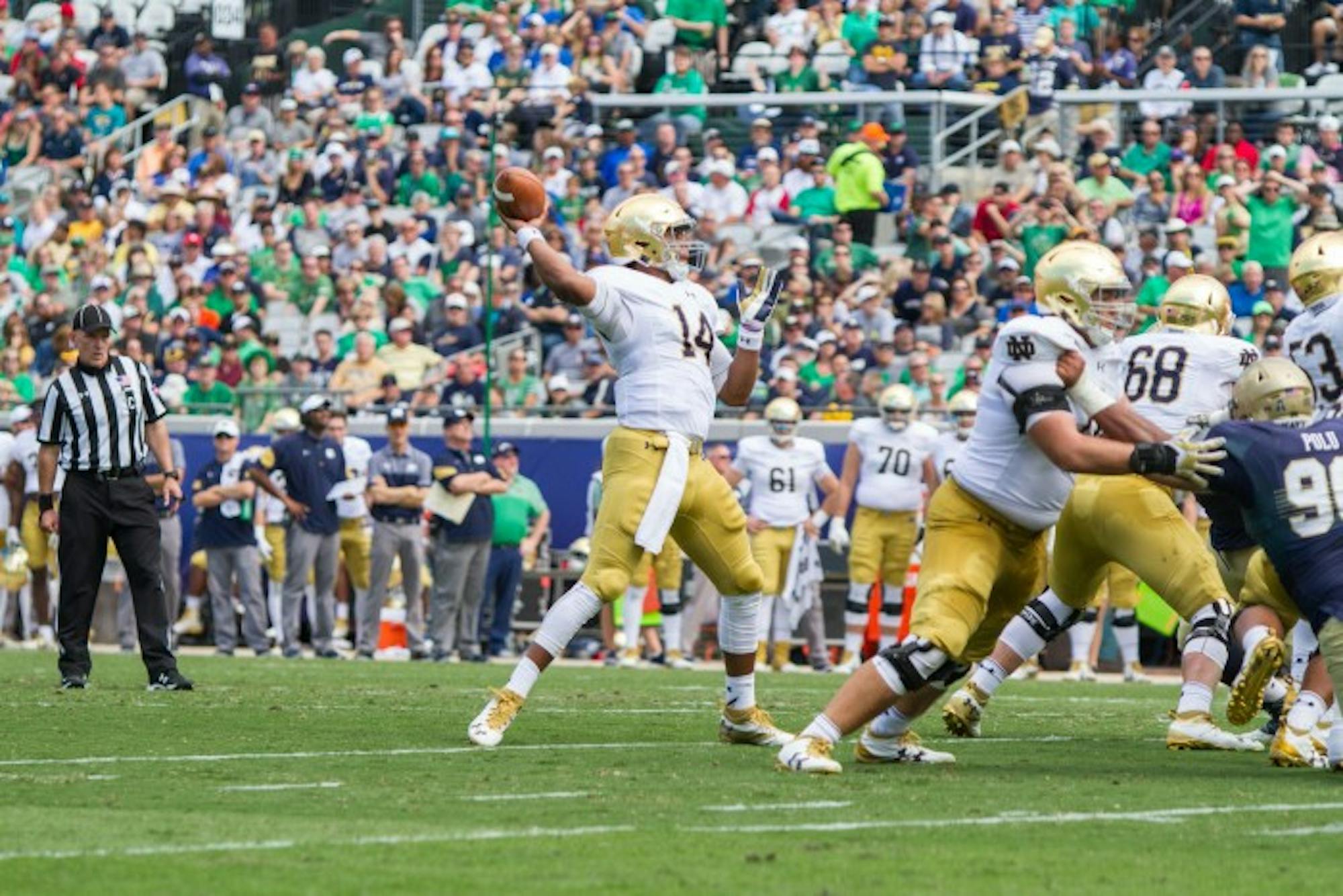 DeShone Kizer throws one downfield during Notre Dame's 27-28 loss to Navy.