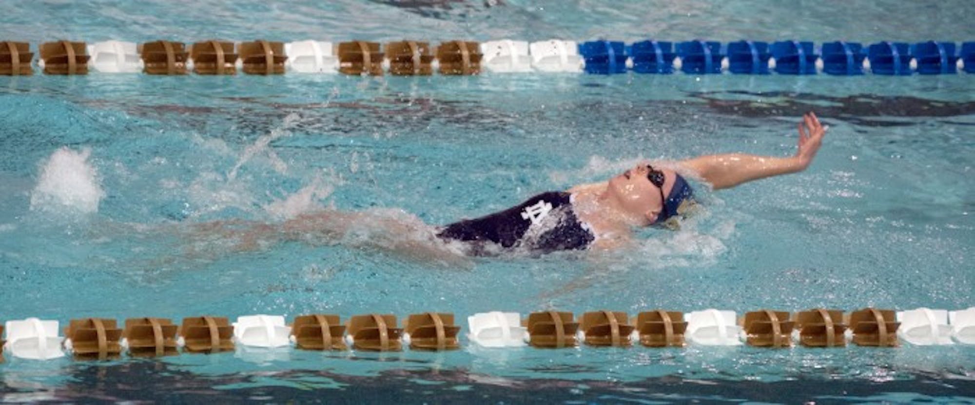 Irish junior Catherine Galletti swims the backstroke during a 219-60 win over Valparaiso on Nov. 15.