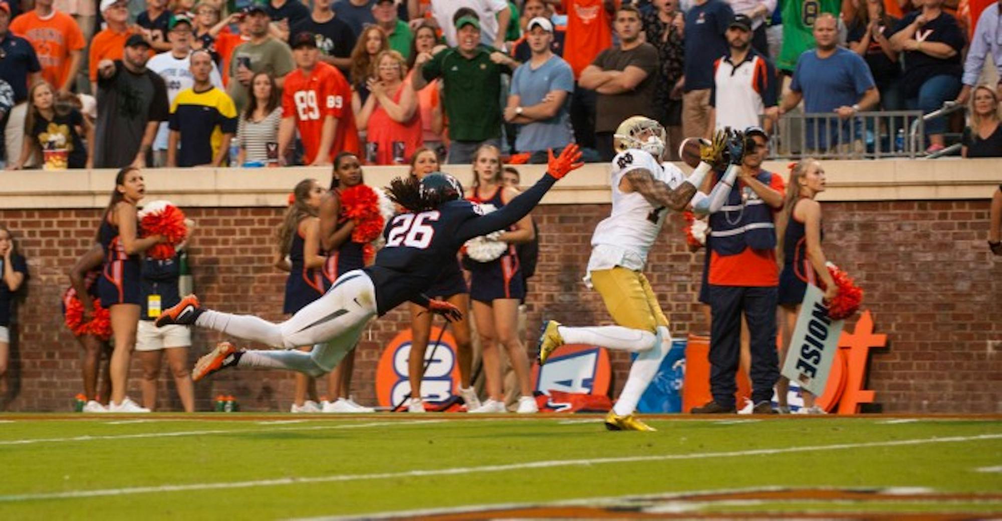Irish junior receiver Will Fuller hauls in the game-winning touchdown reception with 12 seconds left to push Notre Dame past Virginia 34-27 at Scott Stadium in Charlottesville, Virginia, on Saturday. The Irish twice led by double digits but needed a late-game drive led by sophomore quarterback DeShone Kizer to top the unranked Cavaliers.