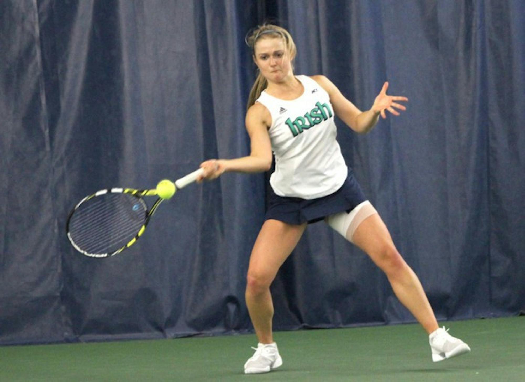 Notre Dame freshman Monica Robinson returns a serve against Indiana on Saturday. Robinson lost in a tie breaker to Indiana senior Sophie Garre, 4-6, 6-3, (10-6).