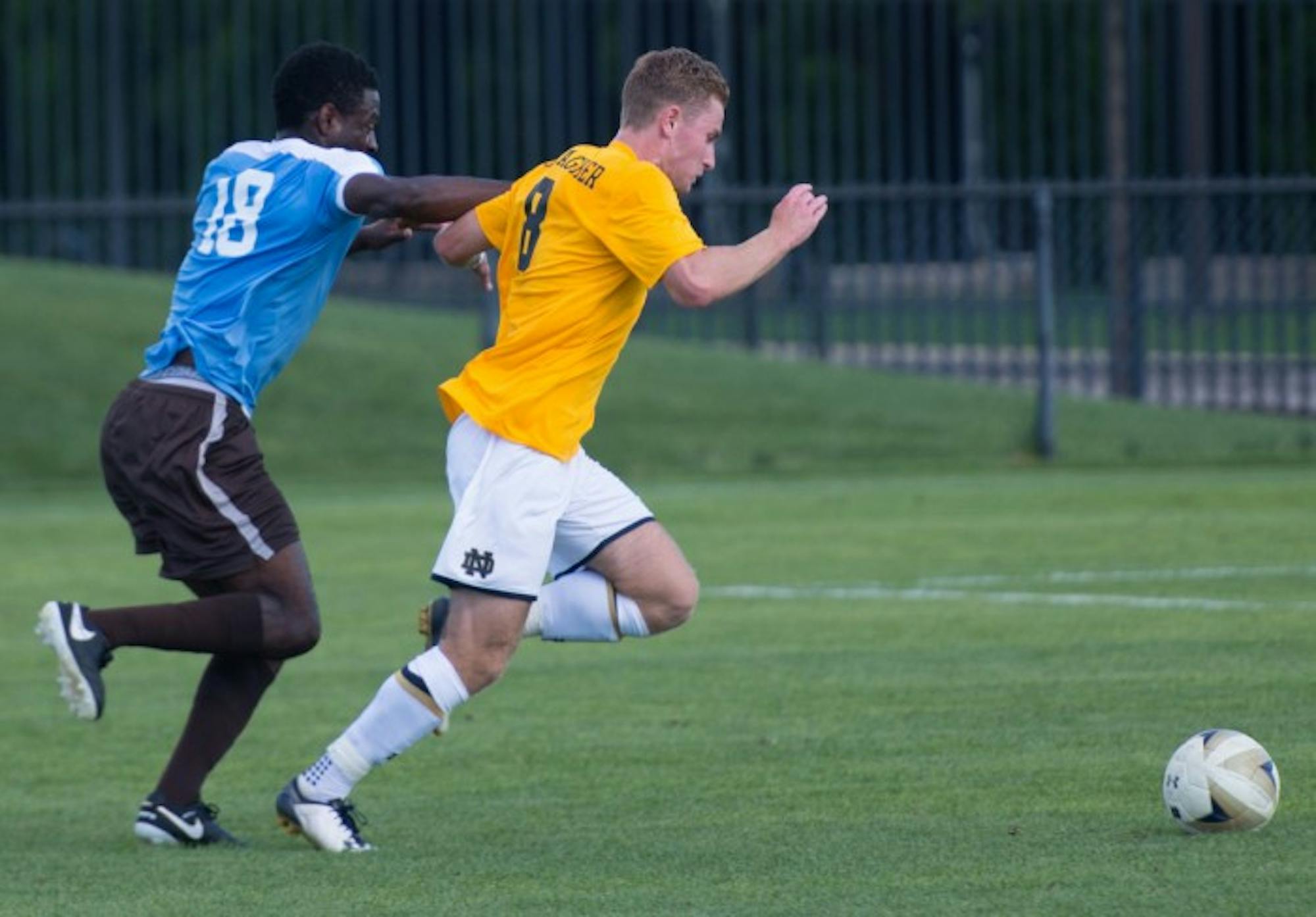 Notre Dame junior forward Jon Gallagher runs past a defender during Notre Dame’s 1-1 tie with Valparaiso on August 22 at Alumni Stadium. Gallagher leads the Irish this season in points with five.