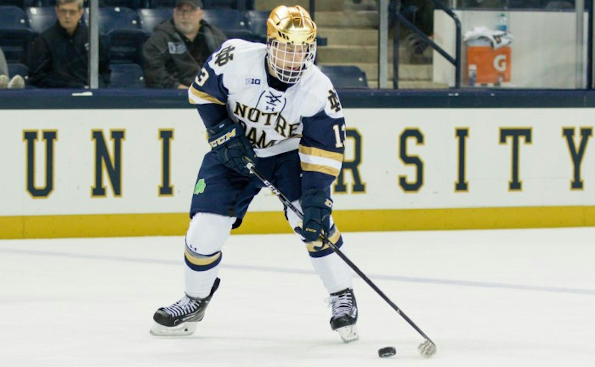 Irish freshman forward Colin Theisen skates with the puck during Notre Dame's 4-3 win over USNTDP on Sunday at Compton Family Ice Arena.