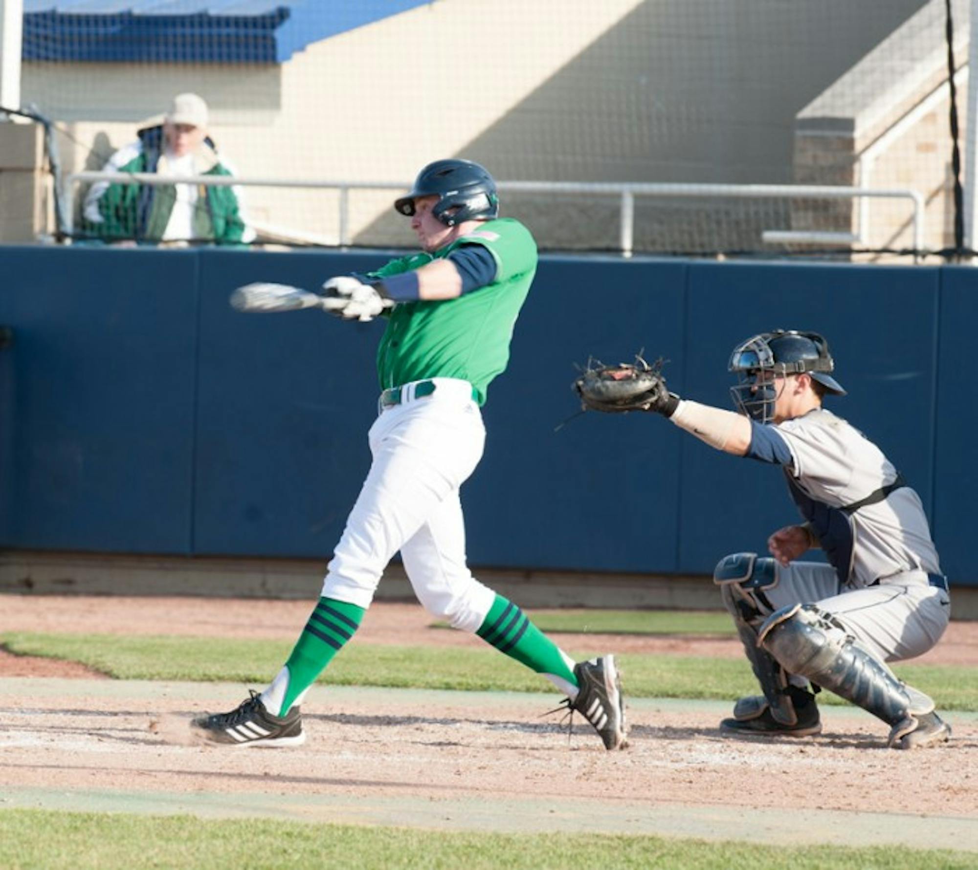 Irish senior catcher Forrest Johnson connects with a pitch during Notre Dame's 12-2 win over Connecticut on April 26, 2013.