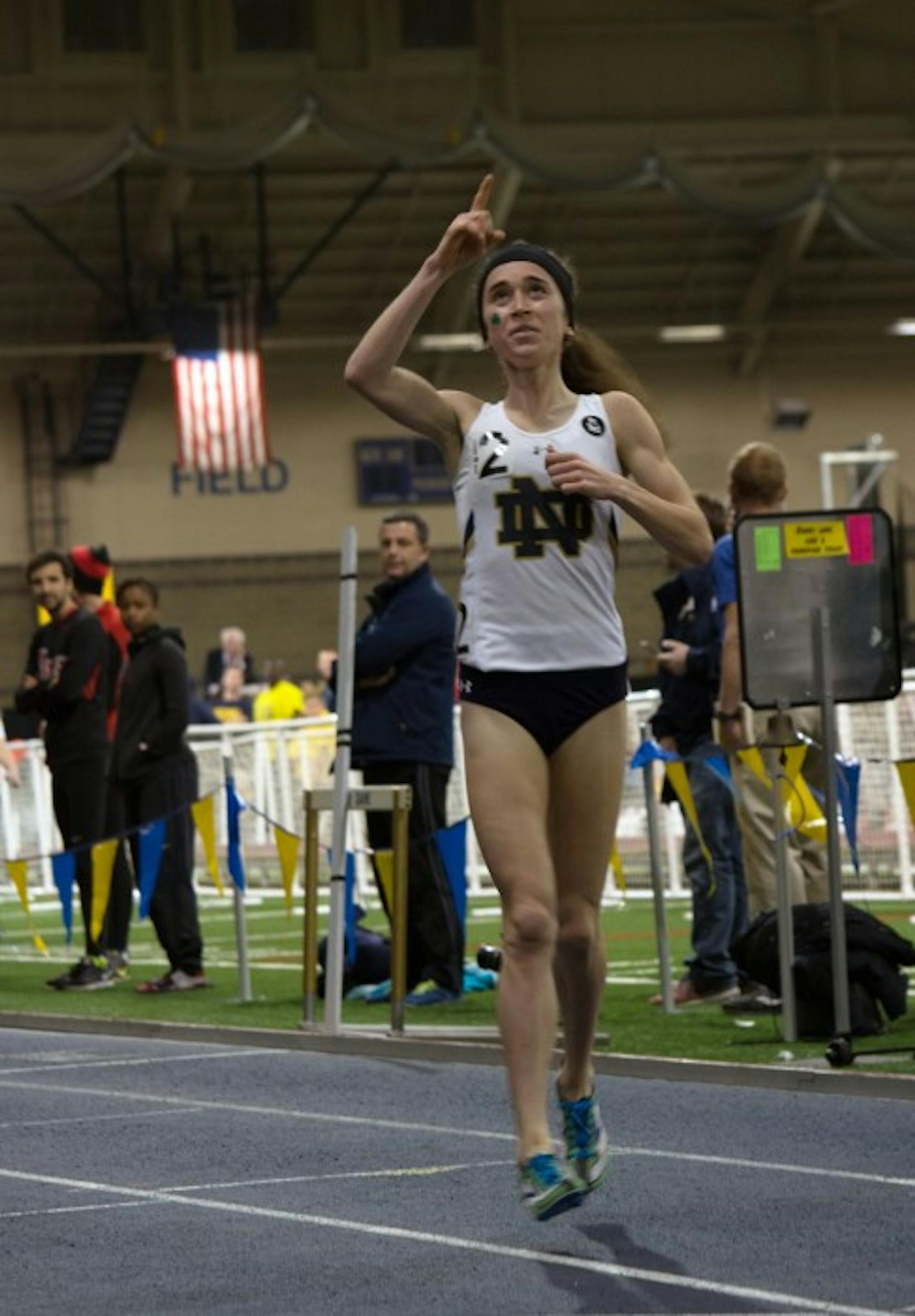 Irish senior Molly Seidel crosses the finish line of the 3,000-meter run after setting a new school record on Saturday at Loftus Sports Center.