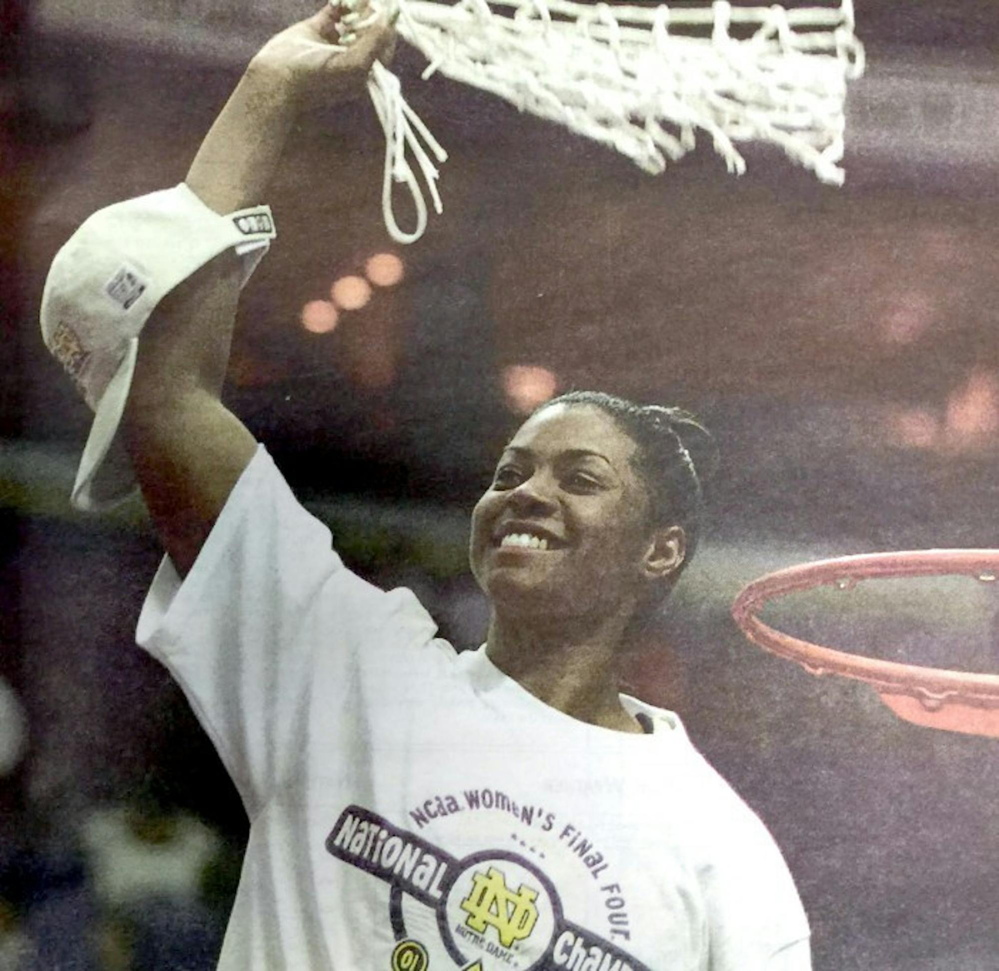 Former Irish guard Niele Ivey celebrates after Notre Dame’s 68-66 win over Purdue in the NCAA championship on April 2, 2001.