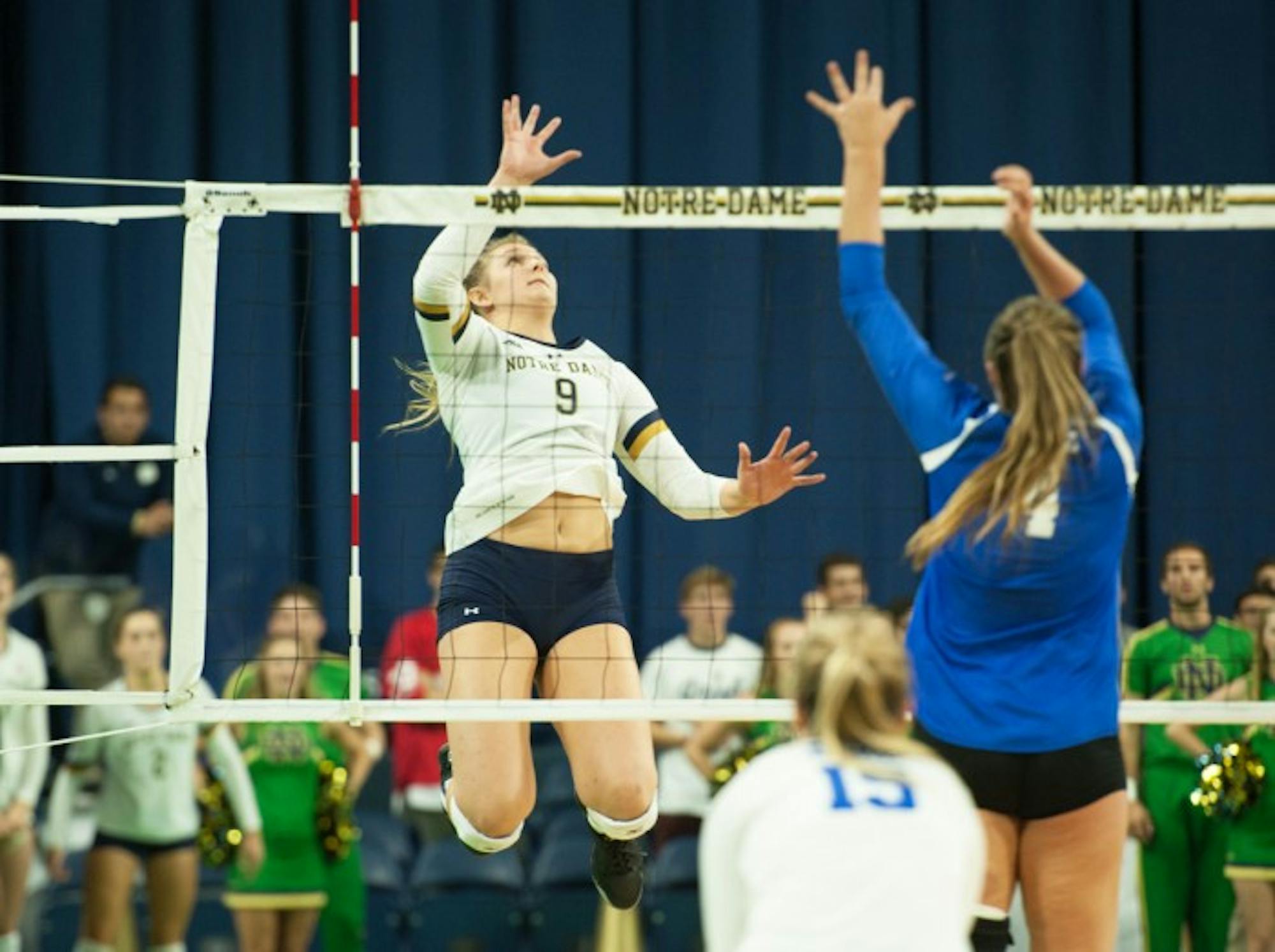 Irish sophomore outside hitter Rebecca Nunge looks to tip the ball during Notre Dame’s 3-1 win over Duke on Sept. 30 at Purcell Pavilion.