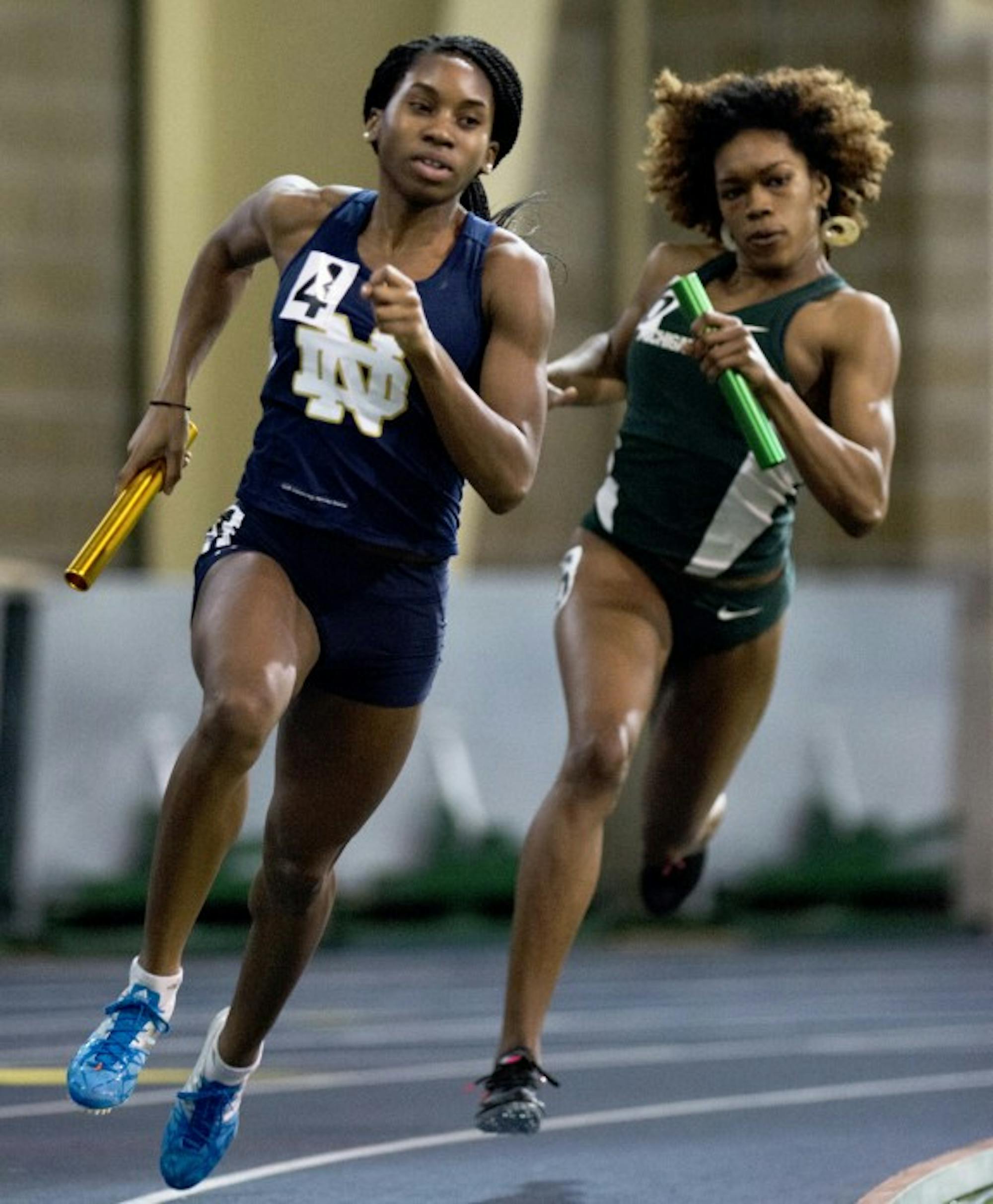 Irish senior Margaret Bamgbose rounds a corner during the 400-meter dash at the Notre Dame Invitational on Jan. 24, 2015. Bamgbose took first place in the same event at the Virginia Challenge on Friday.