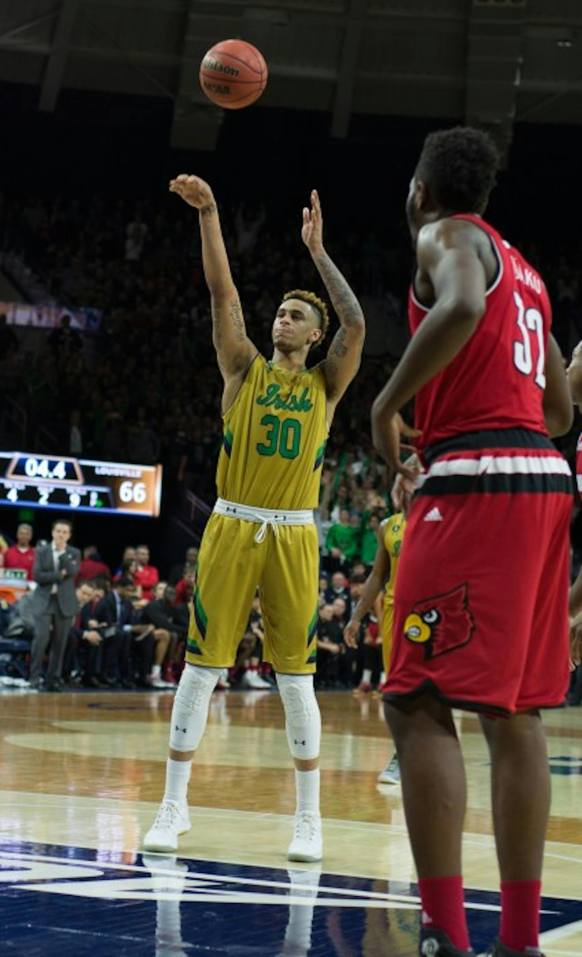 Irish senior forward Zach Auguste shoots a free throw during Notre Dame’s 71-66 win over Louisville on Feb. 13 at Purcell Pavilion.