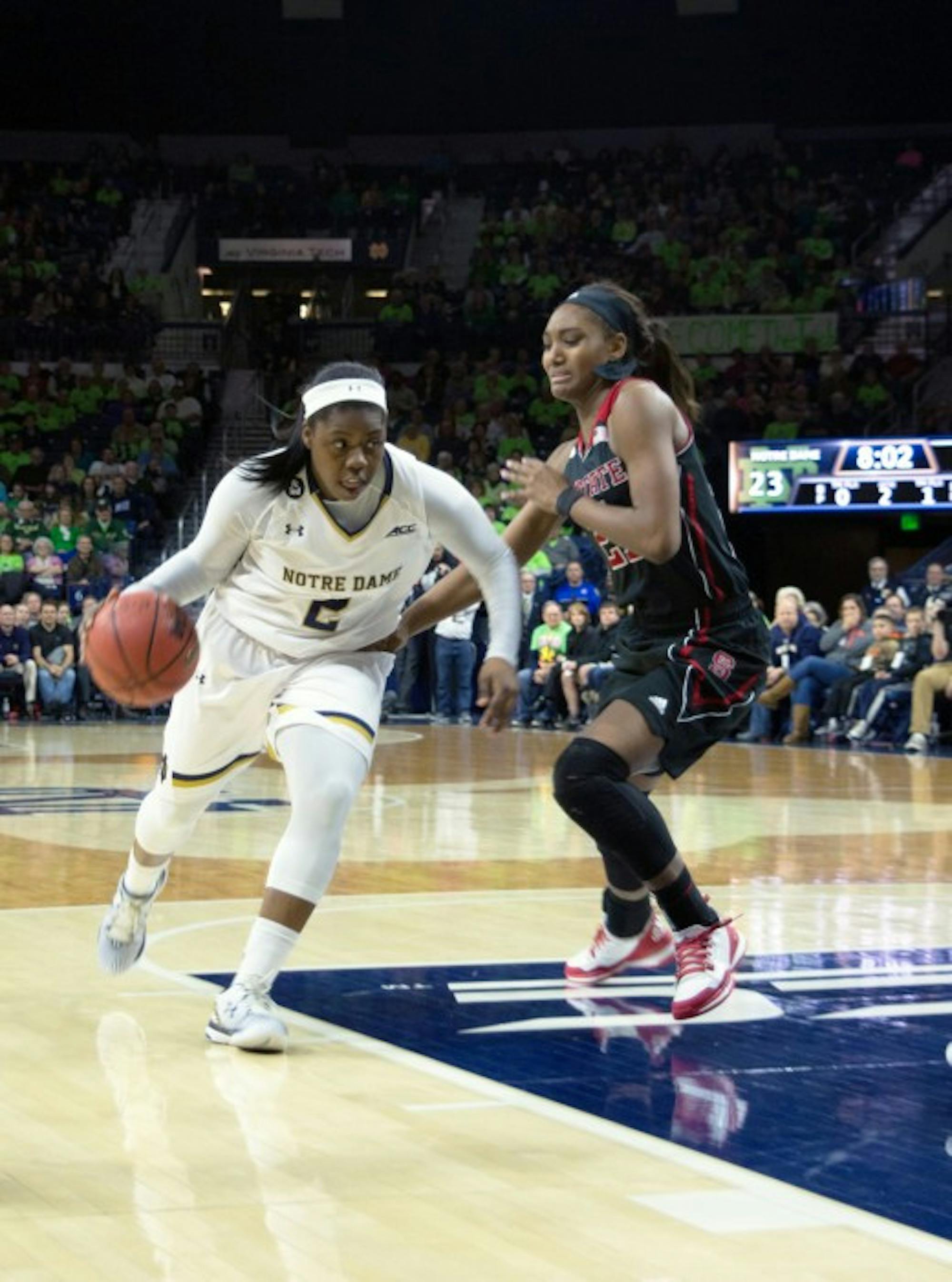 Irish freshman guard Arike Ogunbowale drives to the hoop during Notre Dame’s 82-46 victory over North Carolina State on Thursday at Purcell Pavilion. Ogunbowale scored a team-high 15 points and grabbed four rebounds during her team’s victory over Louisville on Sunday.