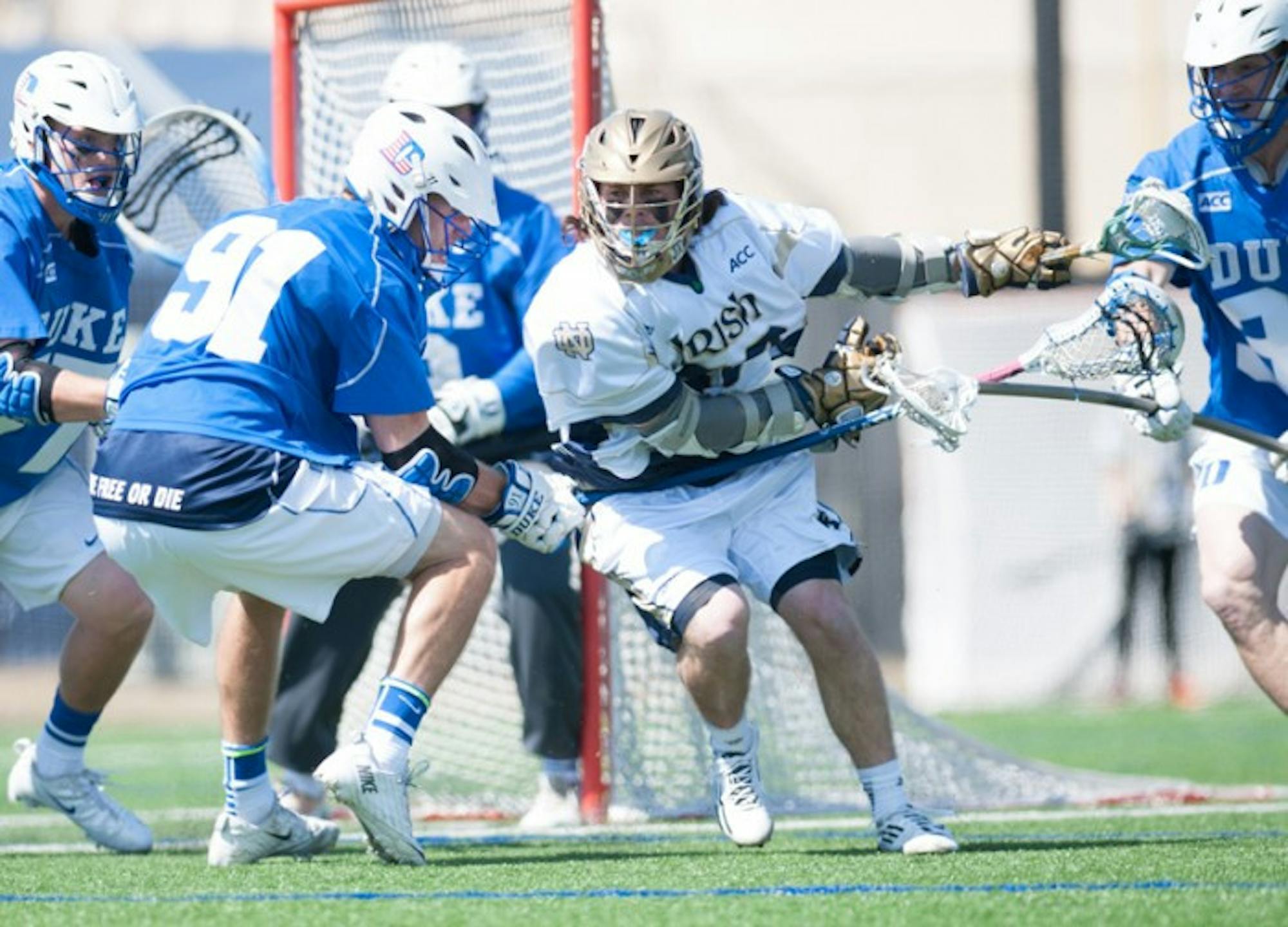 Sophomore attackman Matt Kavanagh tries to sneak past a defender during Notre Dame's 15-7 loss to the Blue Devils on April 5.