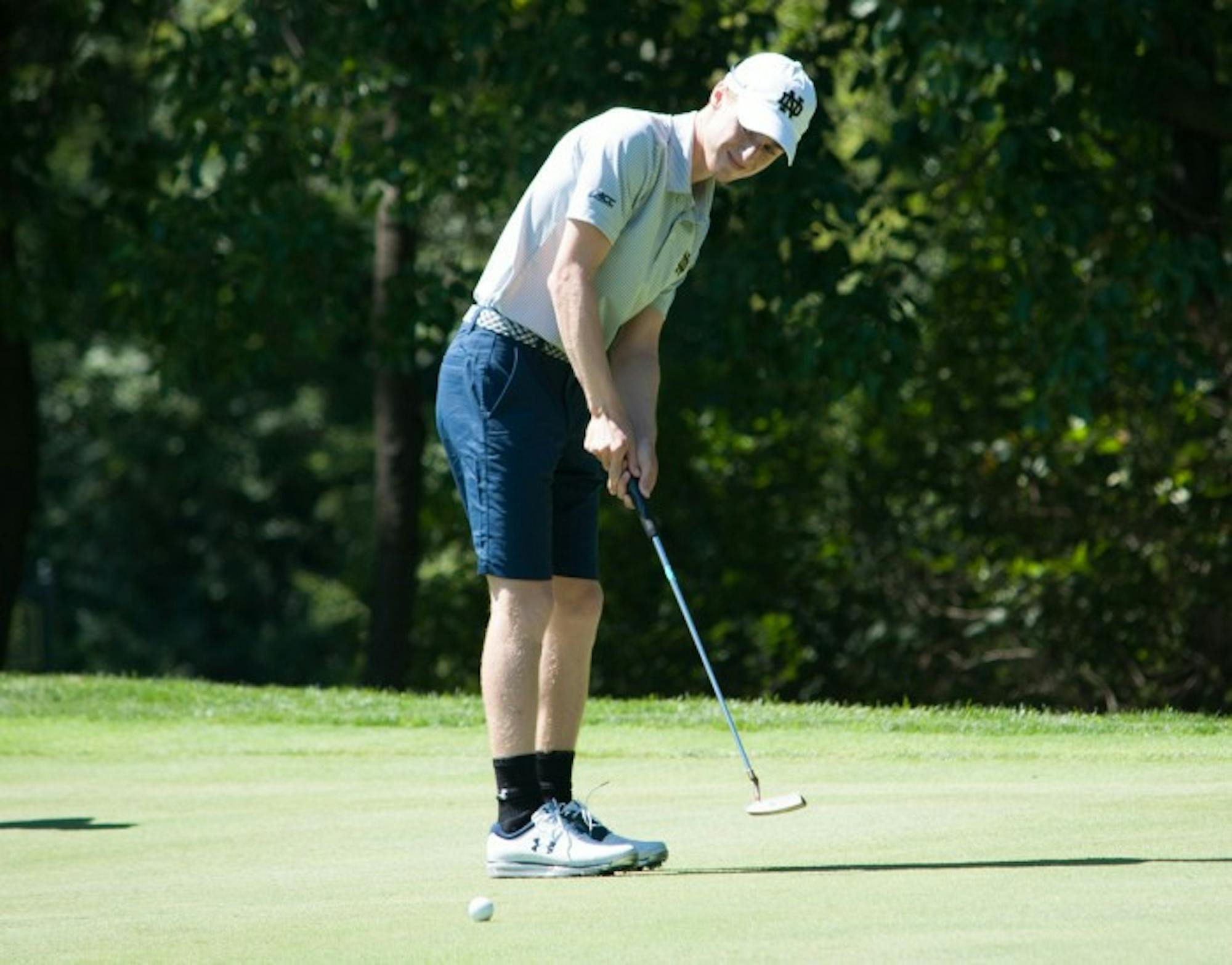 Sophomore Ben Albin watches his putt at the Notre Dame Kickoff Challenge at Warren Golf Course on Sept. 3. Albin won the Georgetown Intercollegiate over fall break with a score of 11-under-par 202.