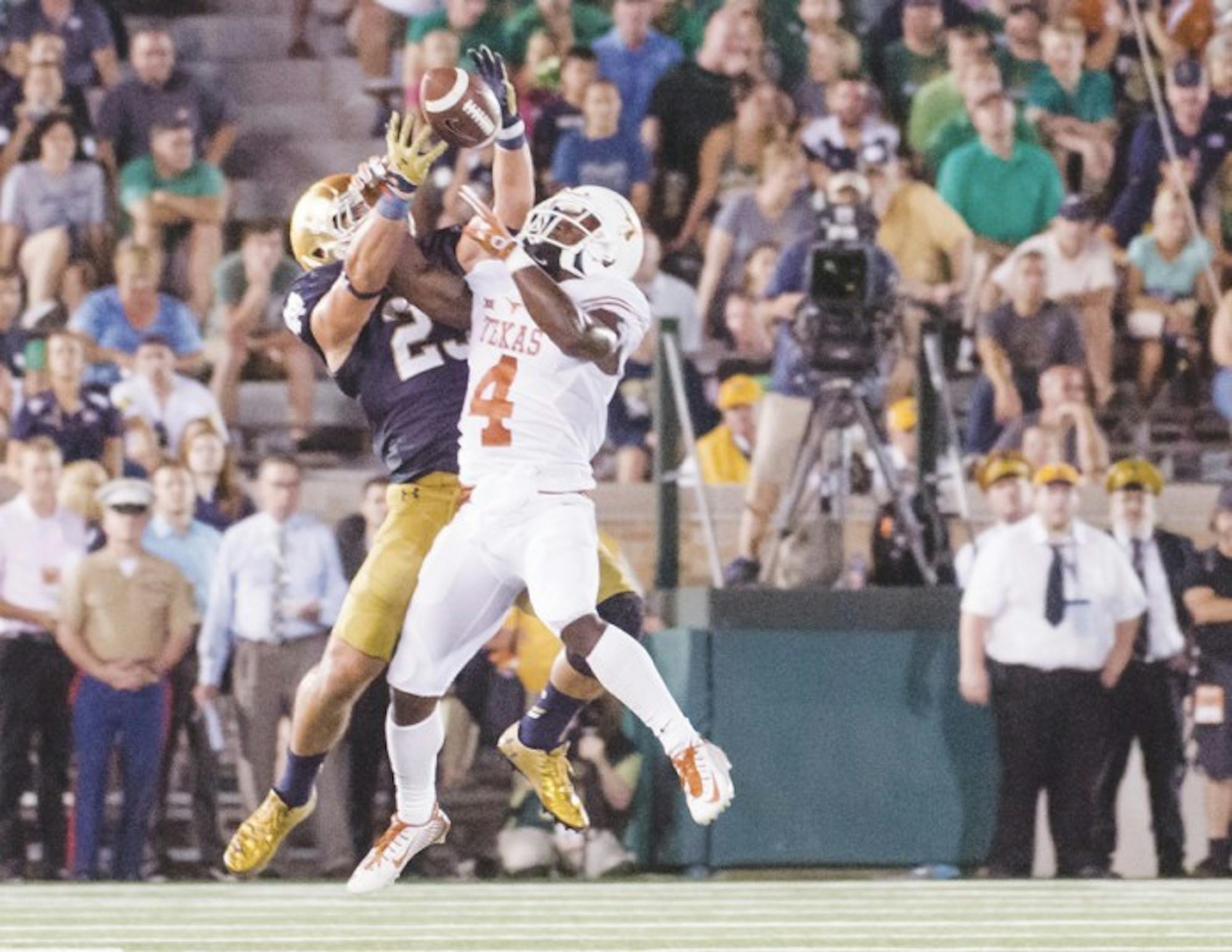 Irish junior safety Drue Tranquill contests a pass during Notre Dame’s 38-3 win last season over Texas. Tranquill tore his ACL two weeks later against Georgia Tech but enters 2016 as the starter at strong safety.