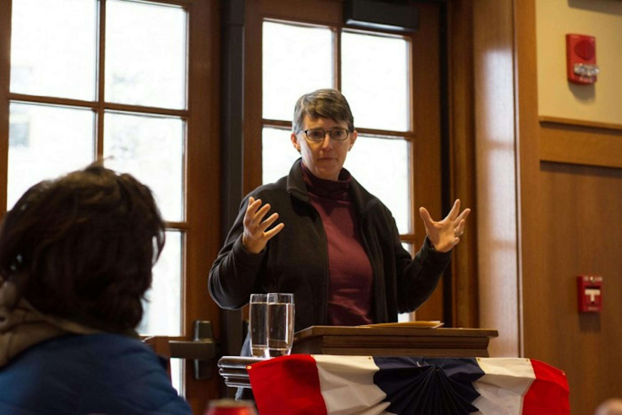 Margaret Pfeil, who holds a joint appointment in the theology department, spoke at an event about income inequality in terms of Catholic social thought and race.