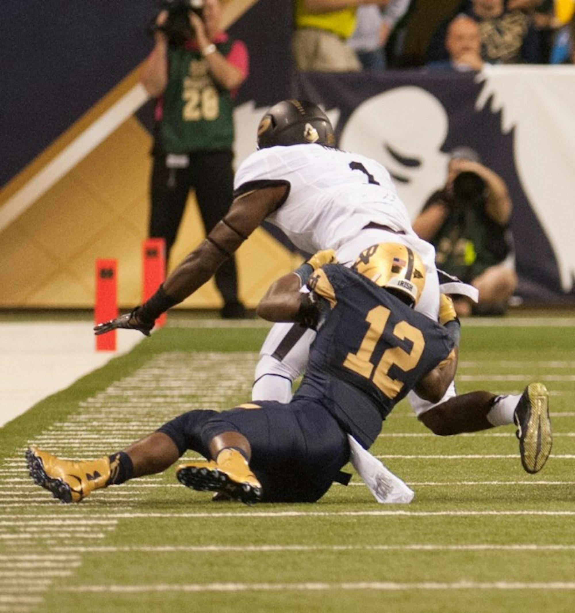 Junior cornerback Devin Butler makes a tackle in a 30-14 victory against Purdue on September 13 at Lucas Oil Stadium. The game was part of Notre Dame’s Shamrock Series.
