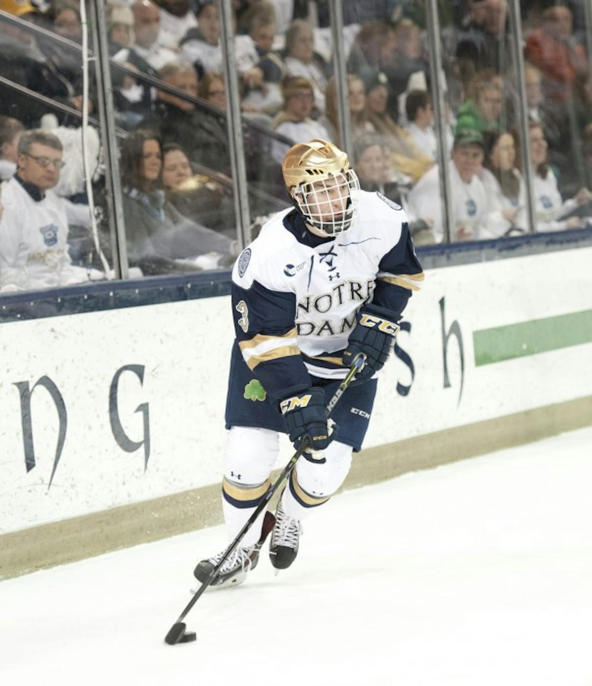 Sophomore defenseman Jordan Gross controls the puck during Notre Dame’s 2-0 loss to Boston College on Feb. 27.