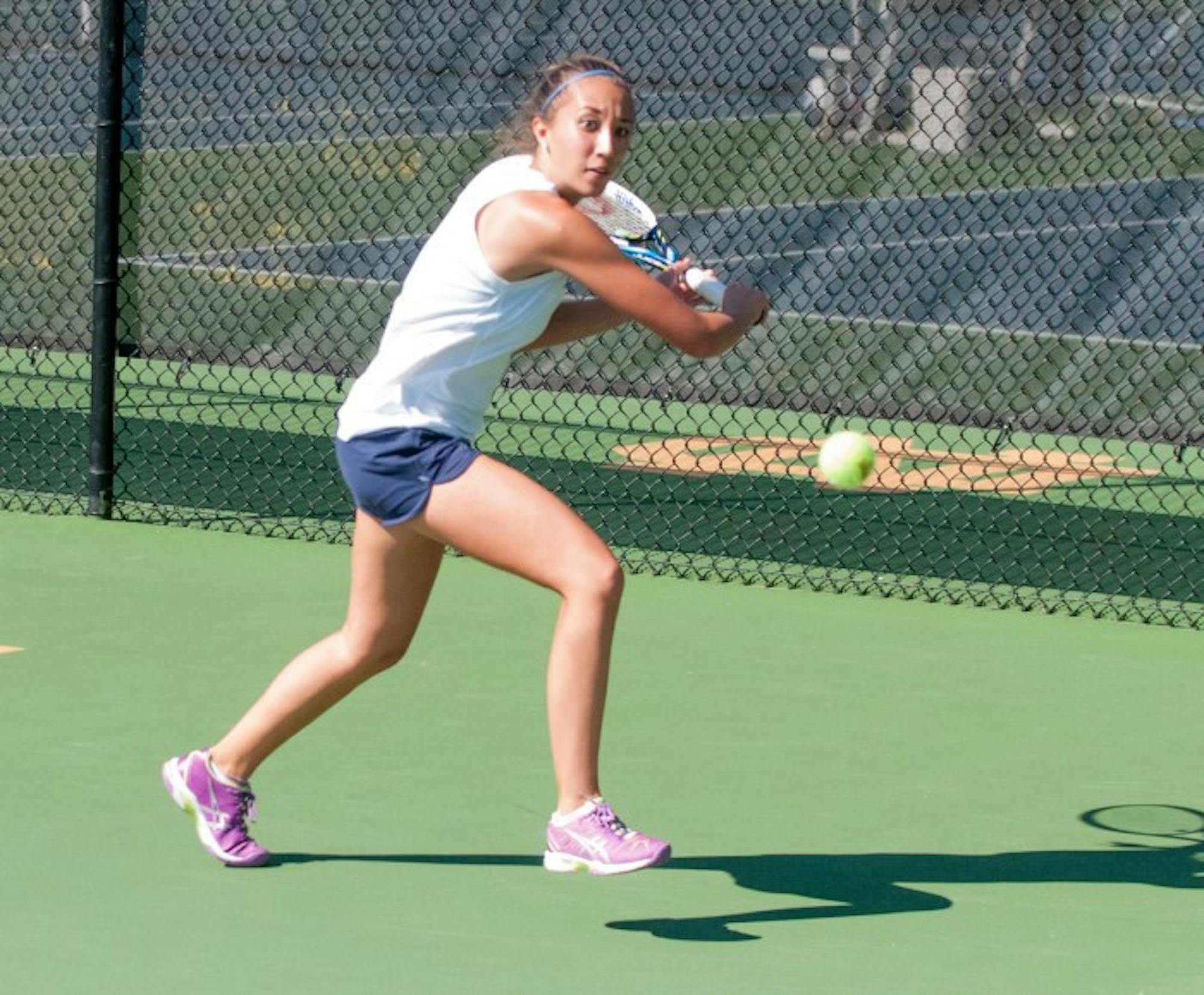 Irish junior Julie Vrabel prepares to unleash a shot during the Notre Dame Invitational on Sept. 26. Vrabel went 1-1 in doubles play on the day and lost her only singles match,