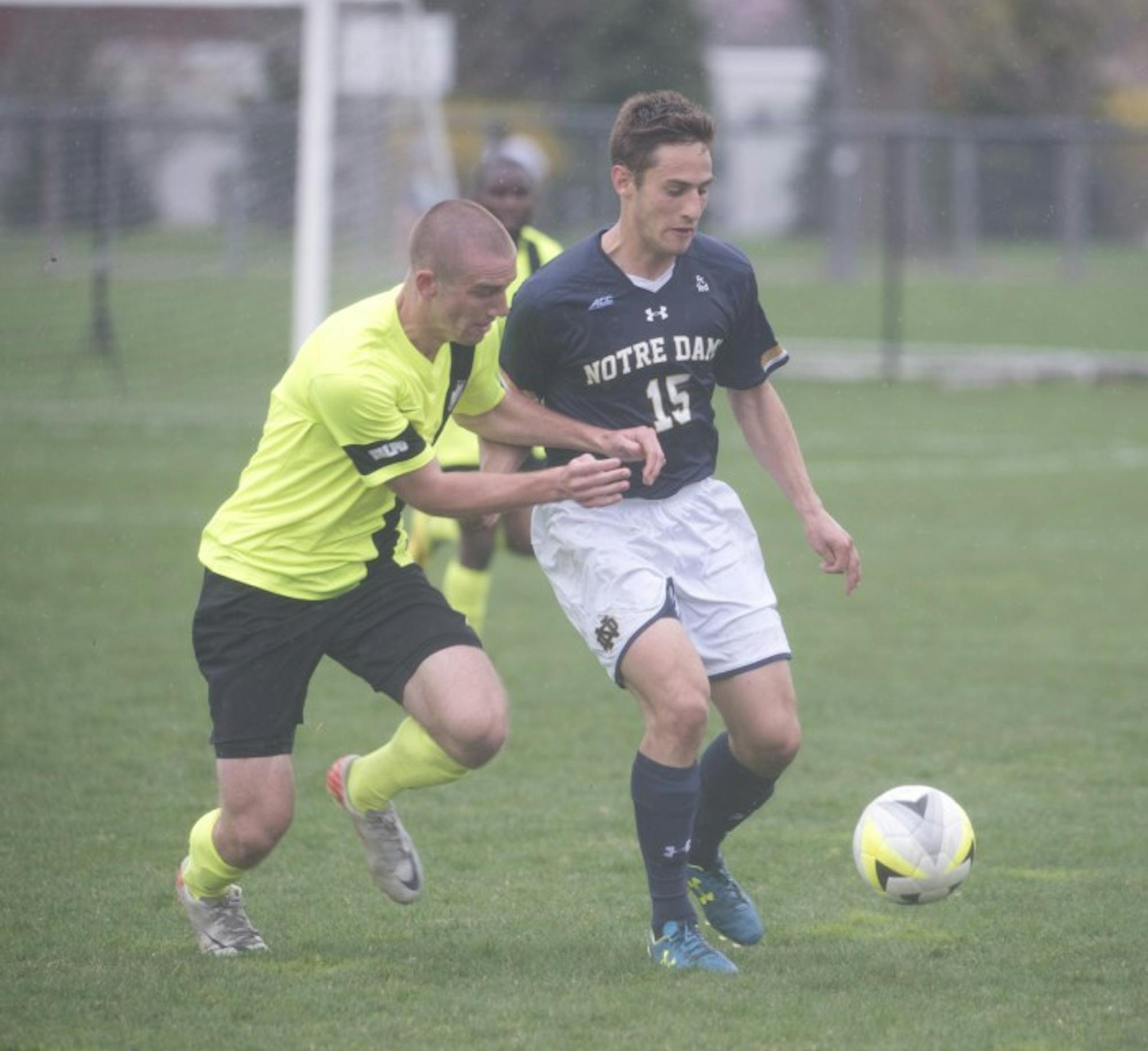 Senior midfielder Evan Panken dribbles away from a defender during a Spring exhibition game against Valparaiso on April 19. Panken had one goal in Friday’s win against Virginia.