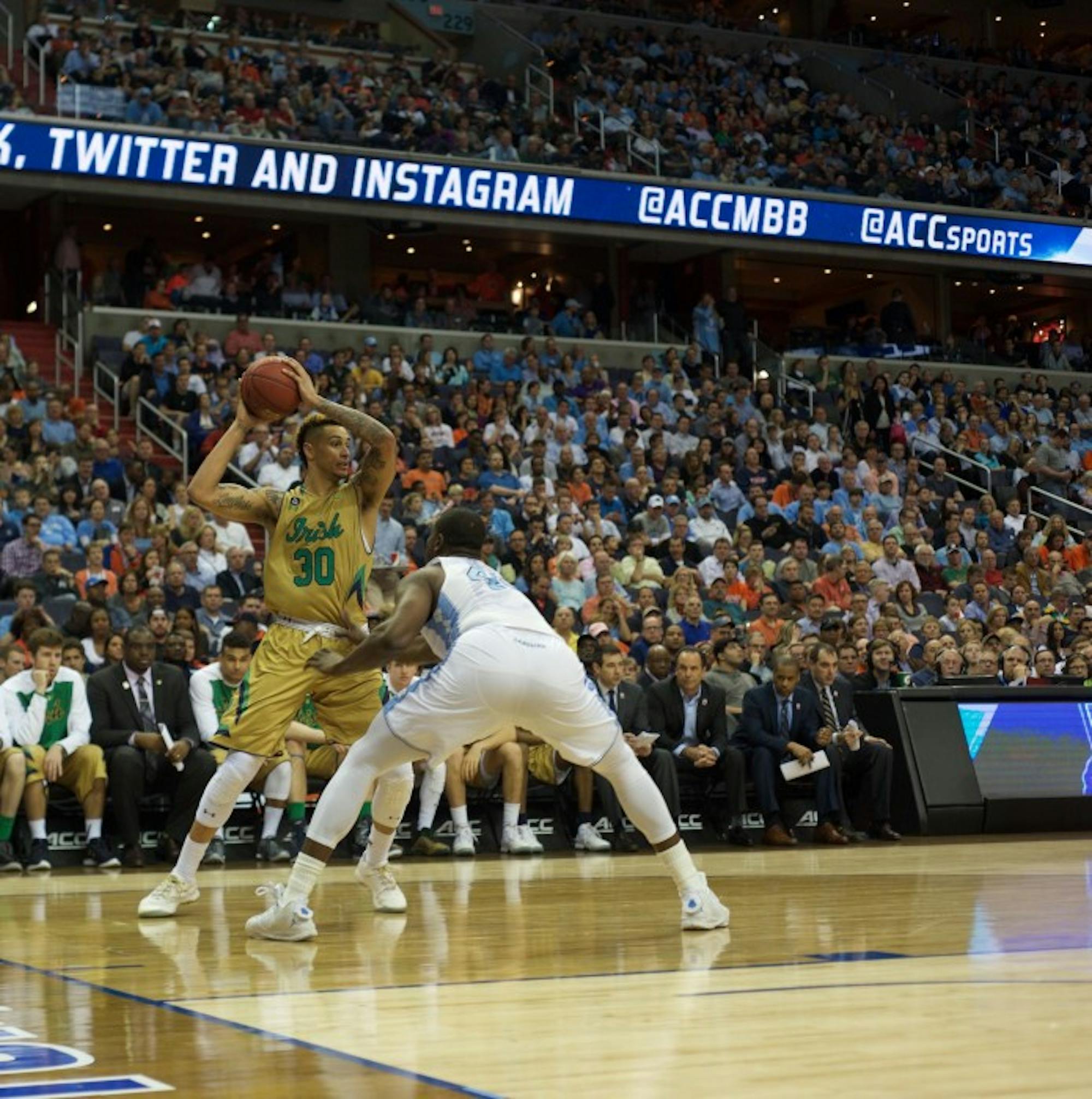Irish senior forward Zach Auguste looks to pass during Notre Dame’s 78-47 loss against North Carolina in the ACC tournament March 11 in Washington.