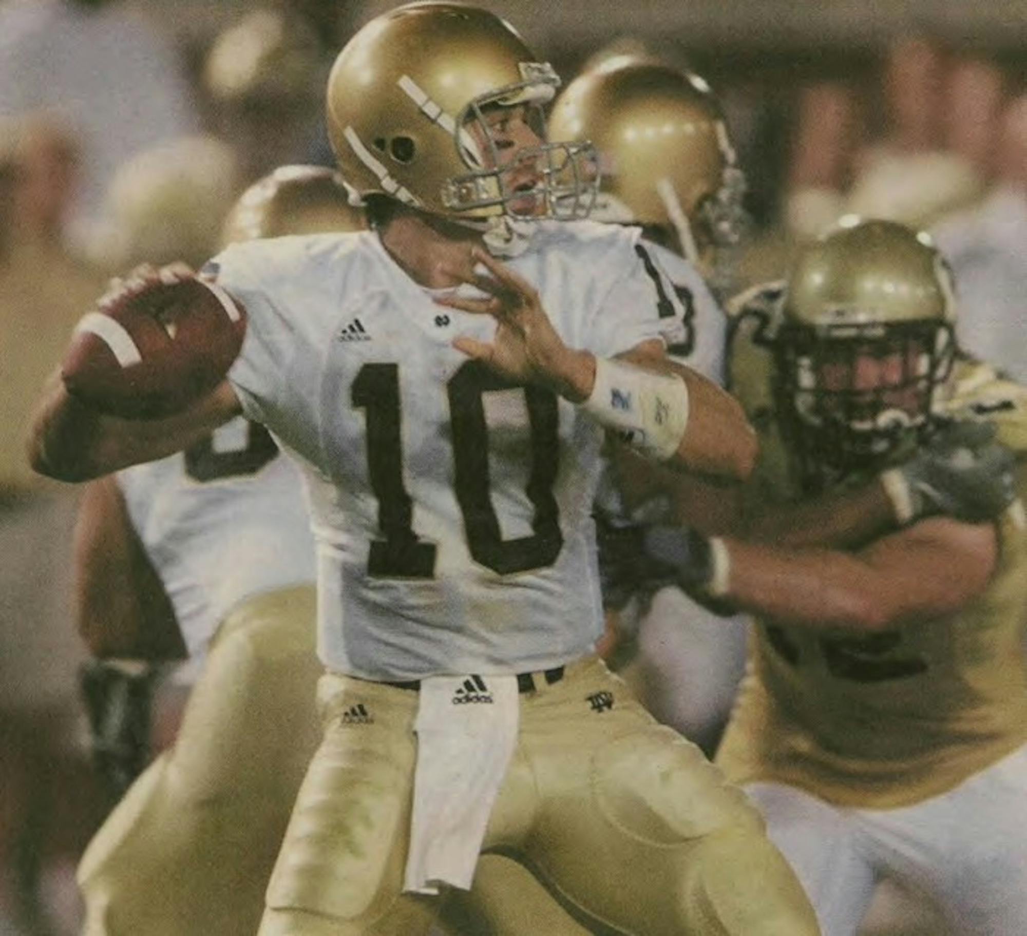 Brady Quinn drops back for a pass in a game against Georgia Teach on Sept. 2, 2006. He led the Irish to a 14-10 come from behind victory in the season opener of Charlie Weis’s second season.
