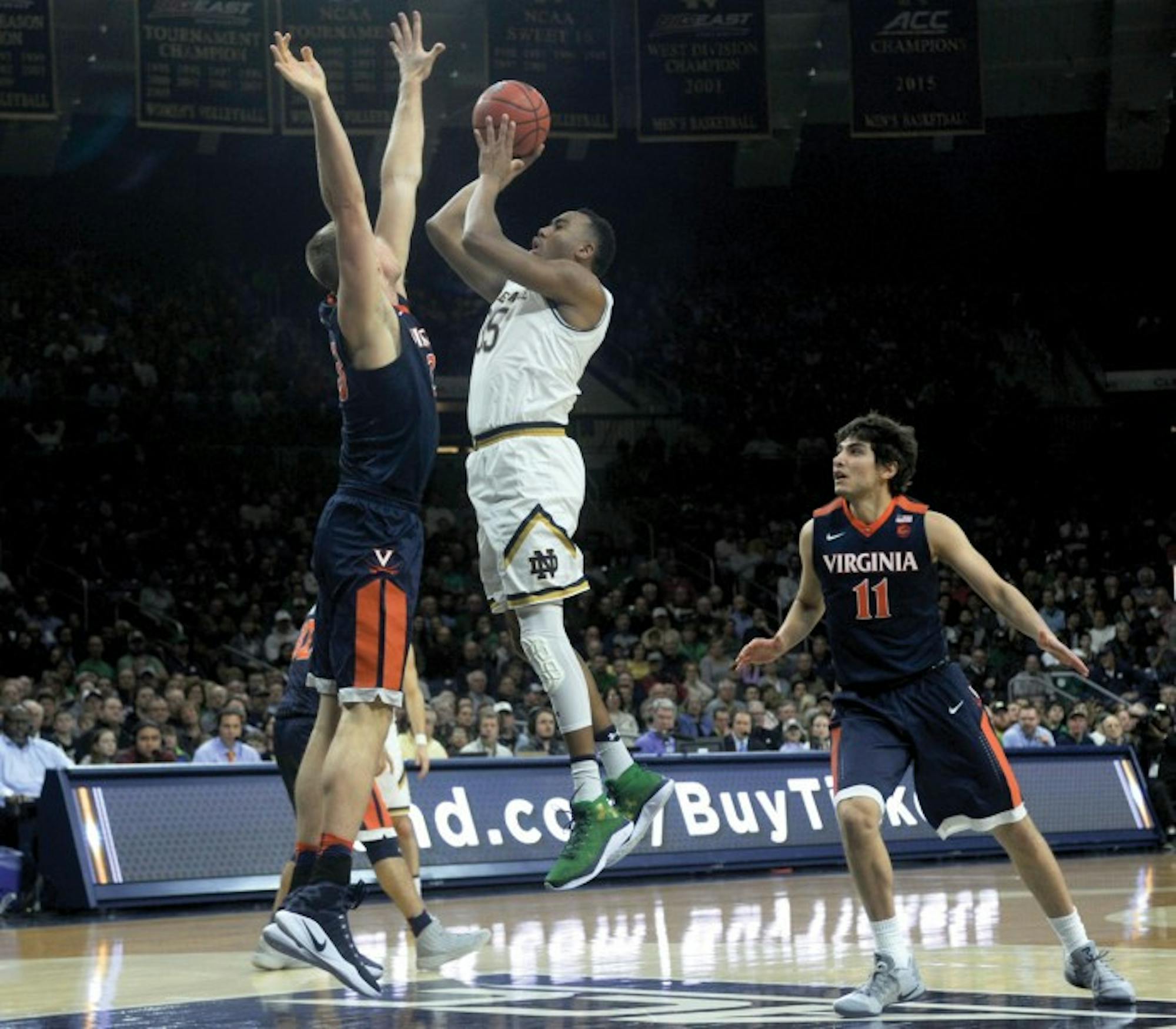 Irish junior forward Bonzie Colson shoots a jumper in Notre Dame’s 71-54 loss to Virginia on Tuesday at Purcell Pavilion.