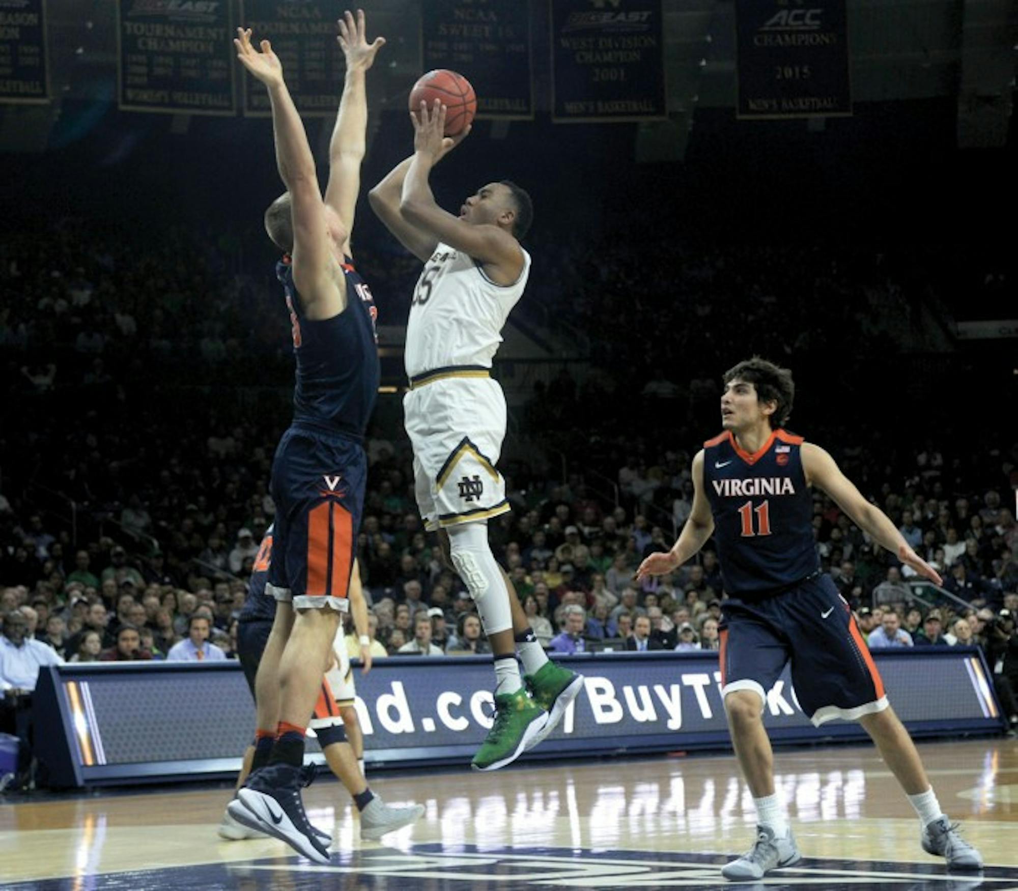 Irish junior forward Bonzie Colson shoots a jumper in Notre Dame’s 71-54 loss to Virginia on Tuesday at Purcell Pavilion.
