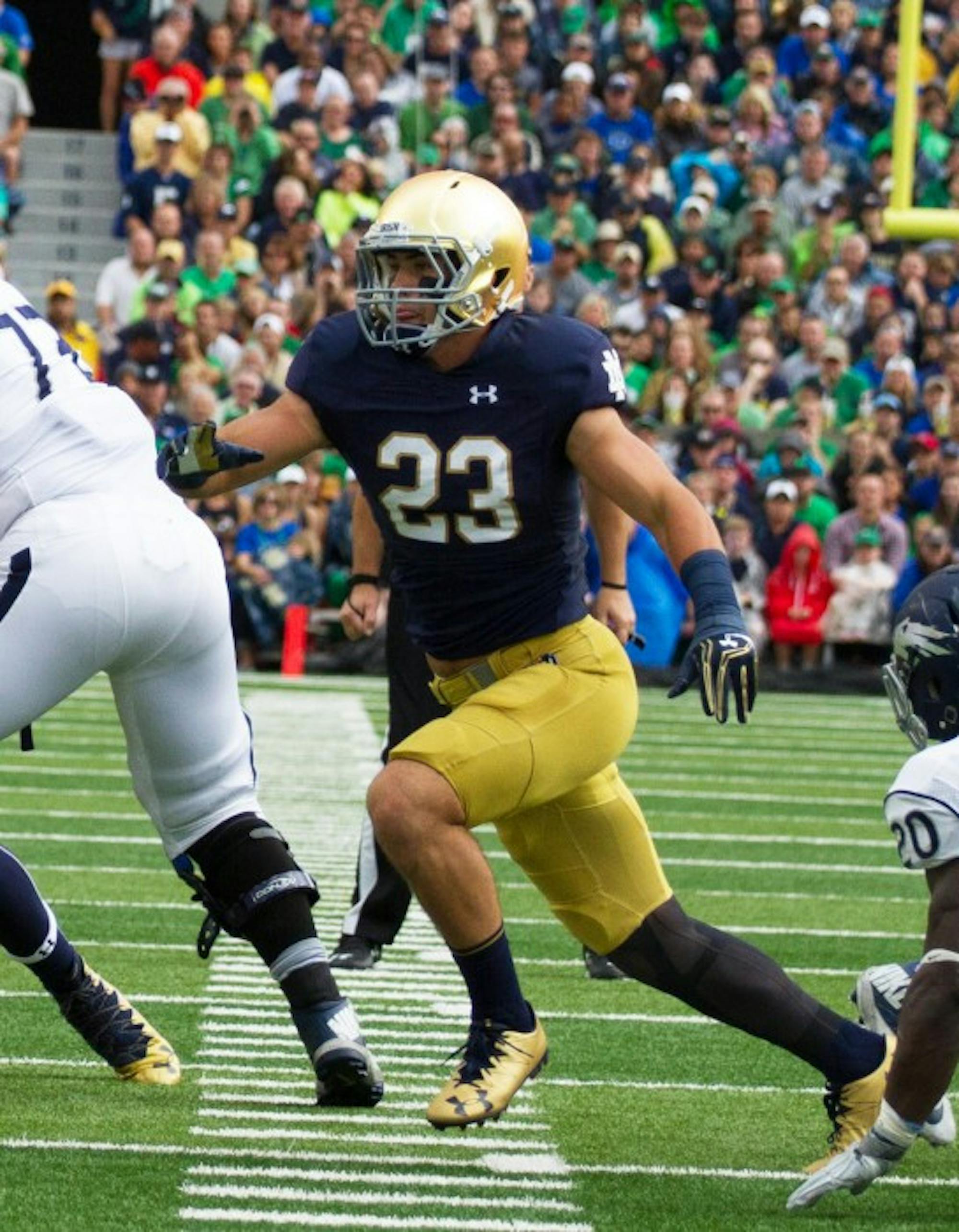 Irish junior safety Drue Tranquill rushes the quarterback in Notre Dame's 39-10 victory over Nevada on Saturday.