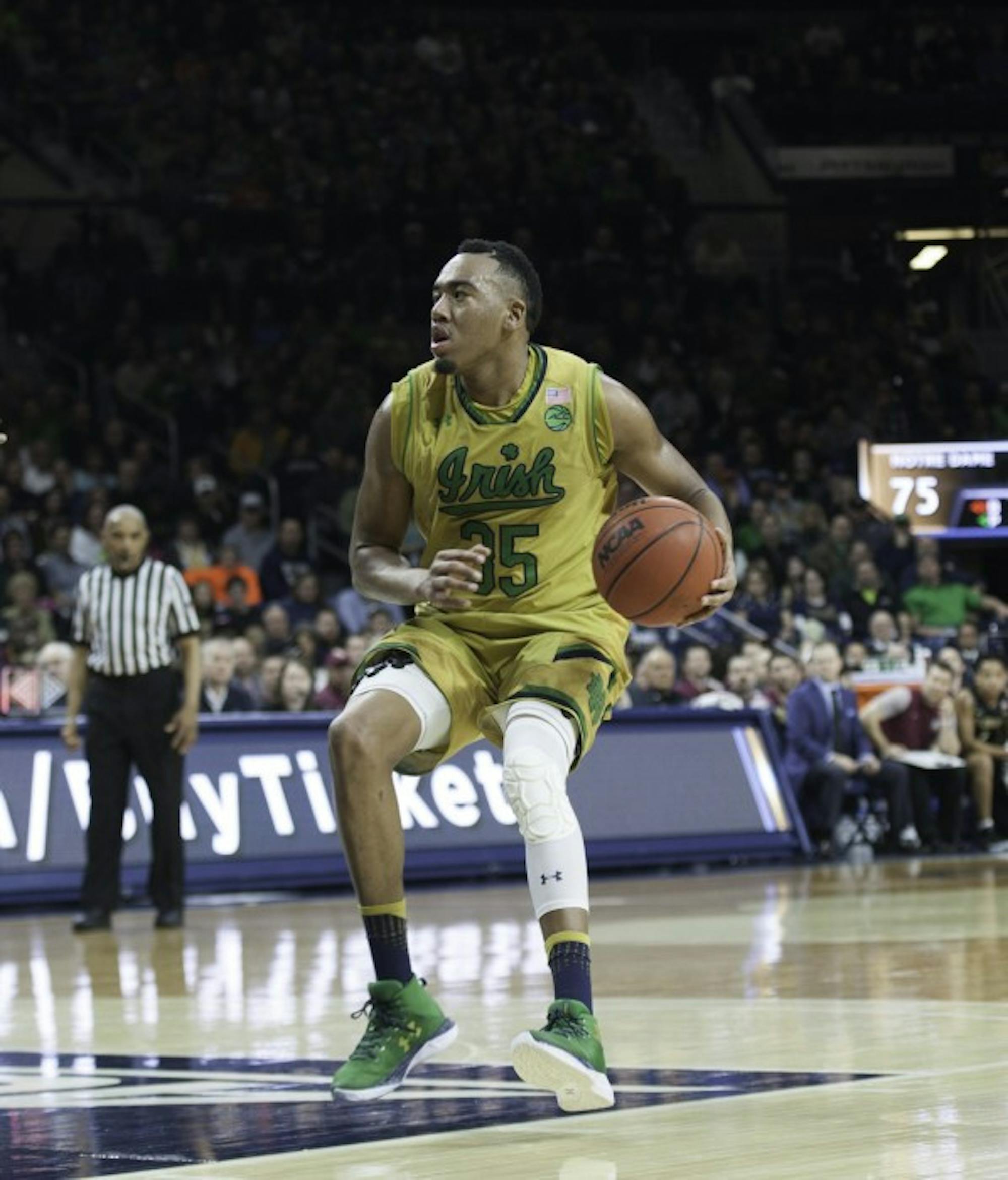 Irish junior forward Bonzie Colson surveys the court during Notre Dame’s 84-72 win over Florida State on Saturday at Purcell Pavilion.