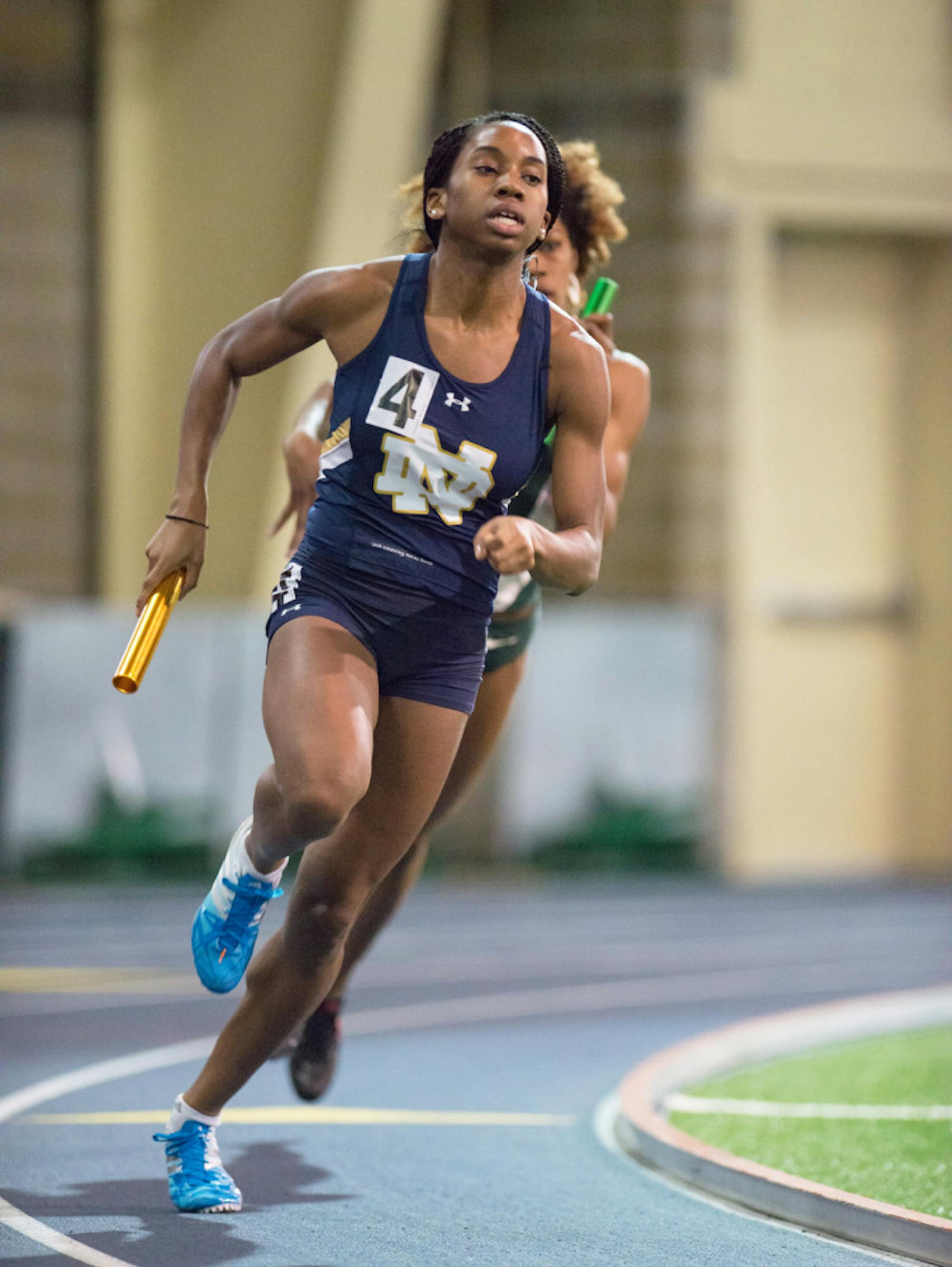 Irish junior Margaret Bamgbose races around the turn in Notre Dame’s second-place 4x400-meter relay Saturday.