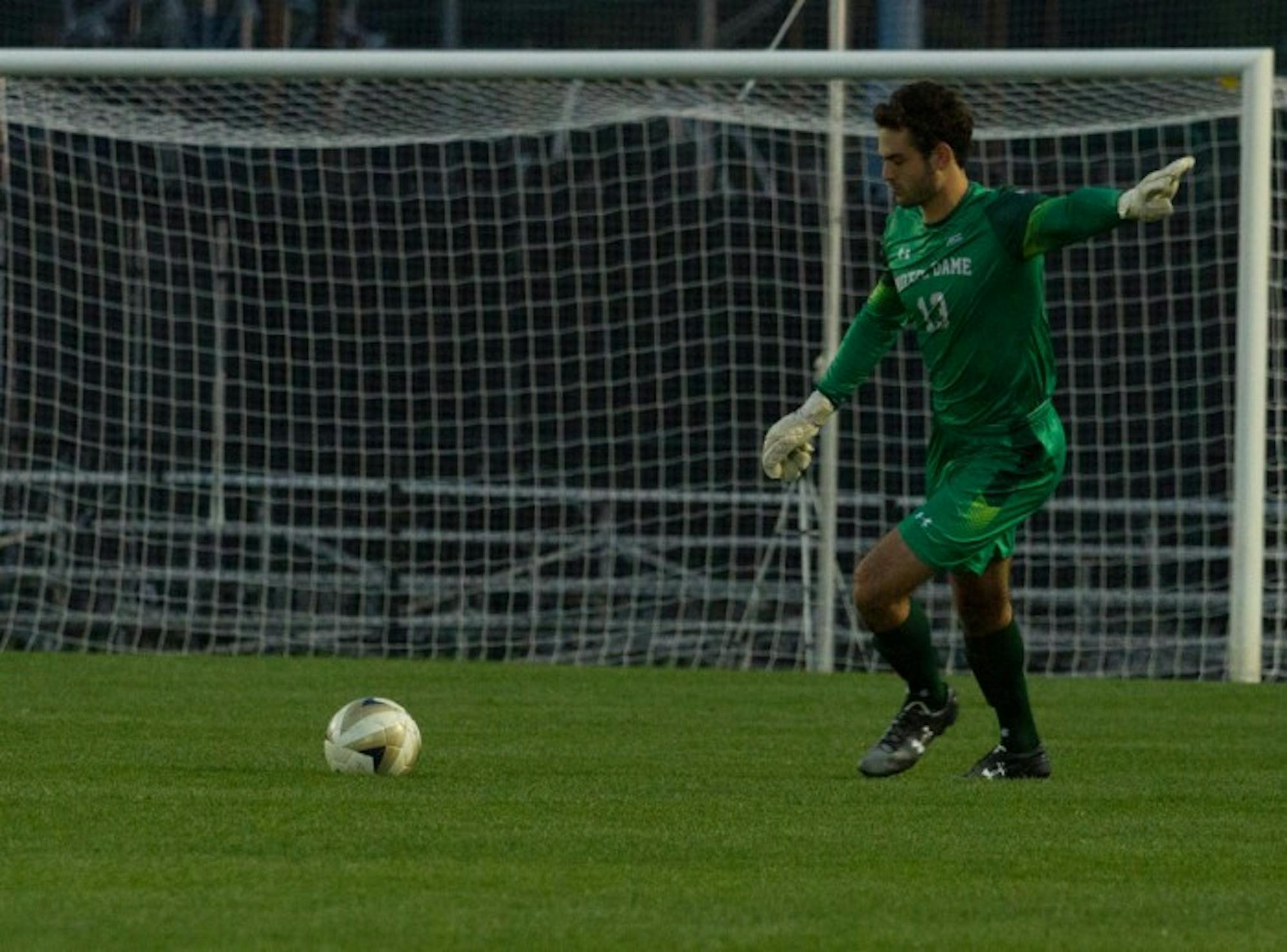 Junior goalkeeper Chris Hubbard kicks a goal kick during Notre Dame’s 3-1 victory over Virginia at Alumni Stadium on Sept. 25. The Irish travel to Virginia Tech for a game against the Hokies on Friday.