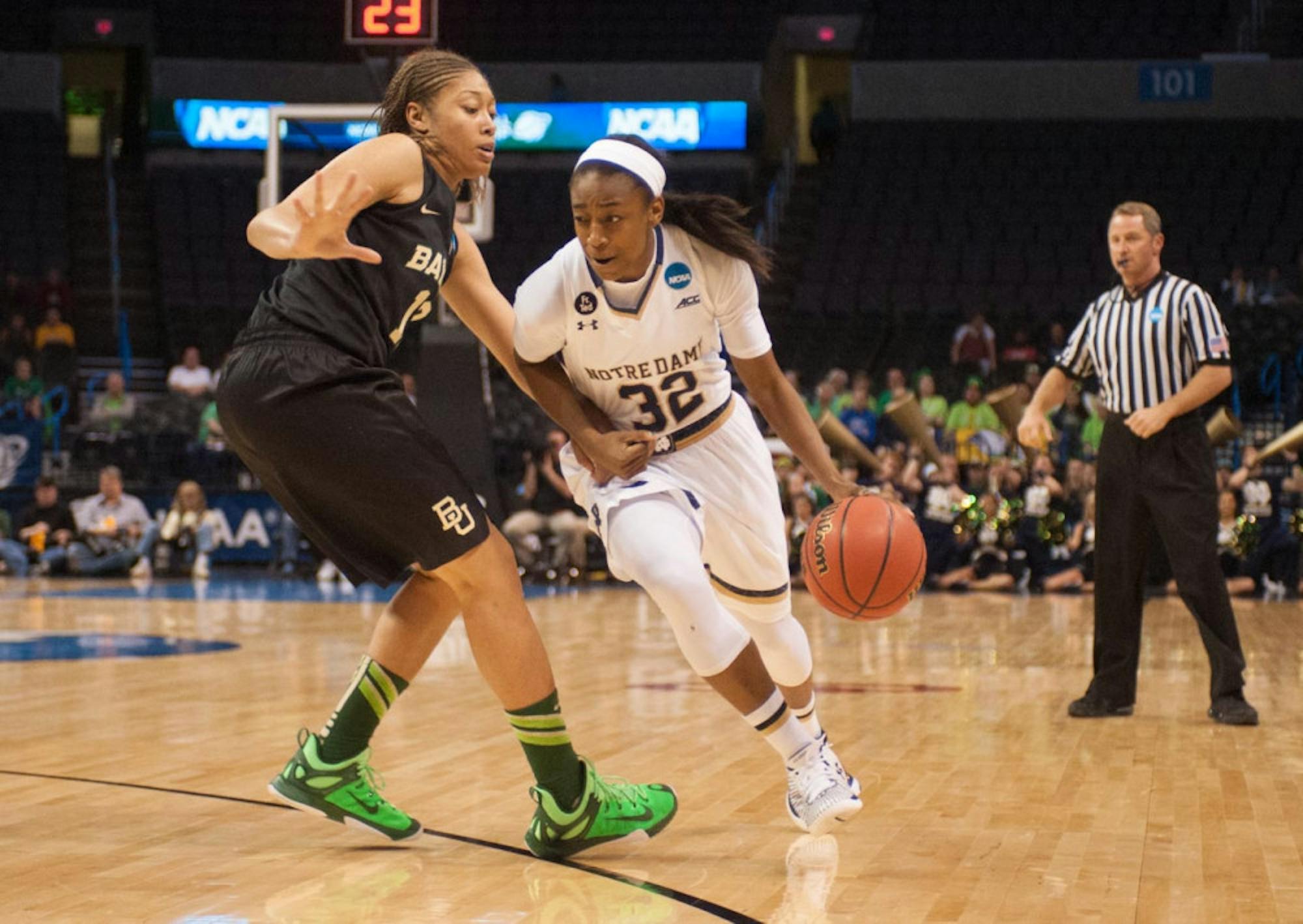 Irish junior guard Jewell Loyd drives past Baylor sophomore guard Alexis Prince during Sunday's Elite Eight game.