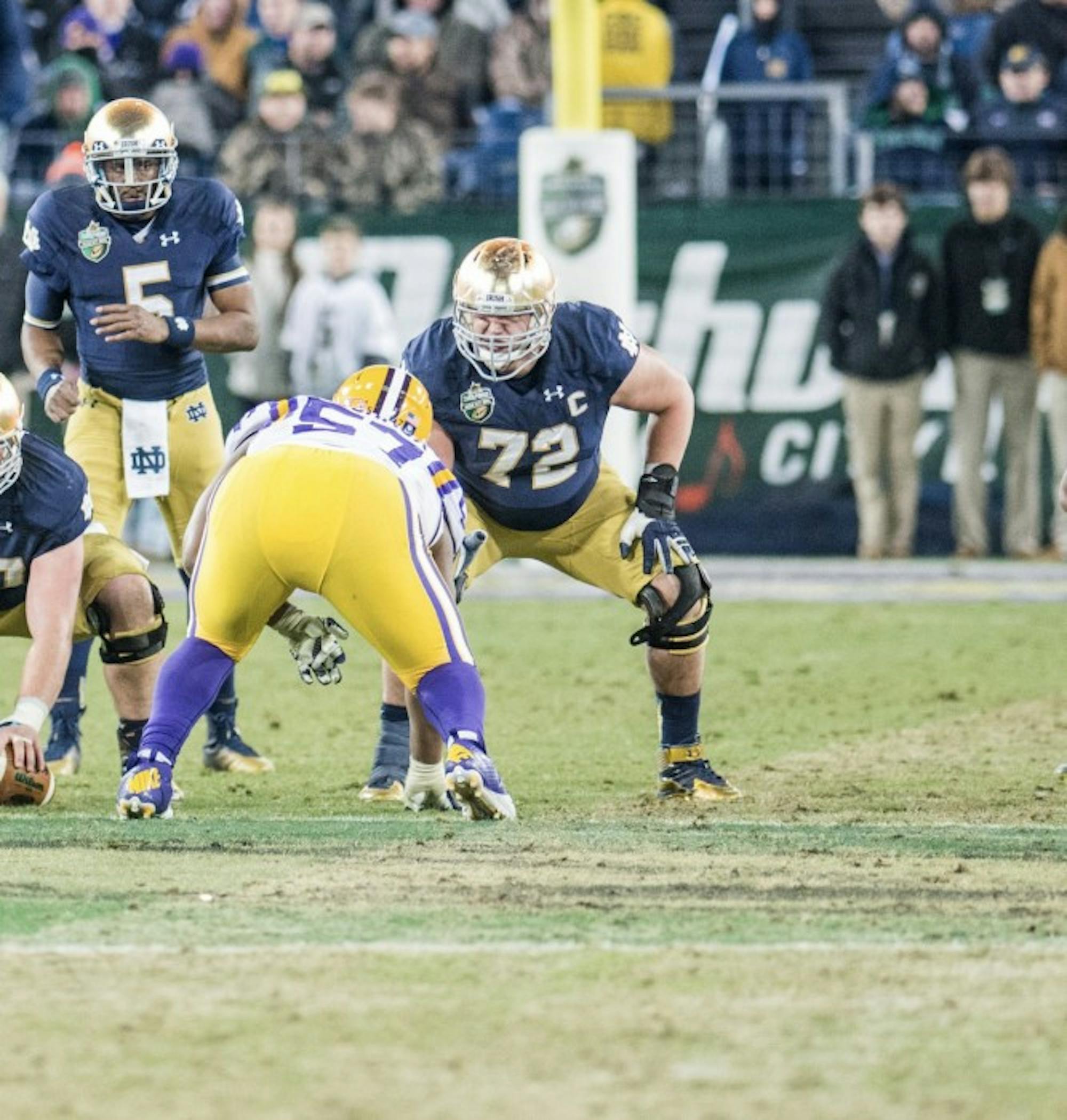 Former Irish offensive lineman Nick Martin readies for the snap during Notre Dame's 31-28 win over LSU in the Franklin American Mortgage Music City Bowl on Dec. 30, 2014. Martin was drafted by the Houston Texans with the 50th-overall pick in the NFL Draft on Friday night.