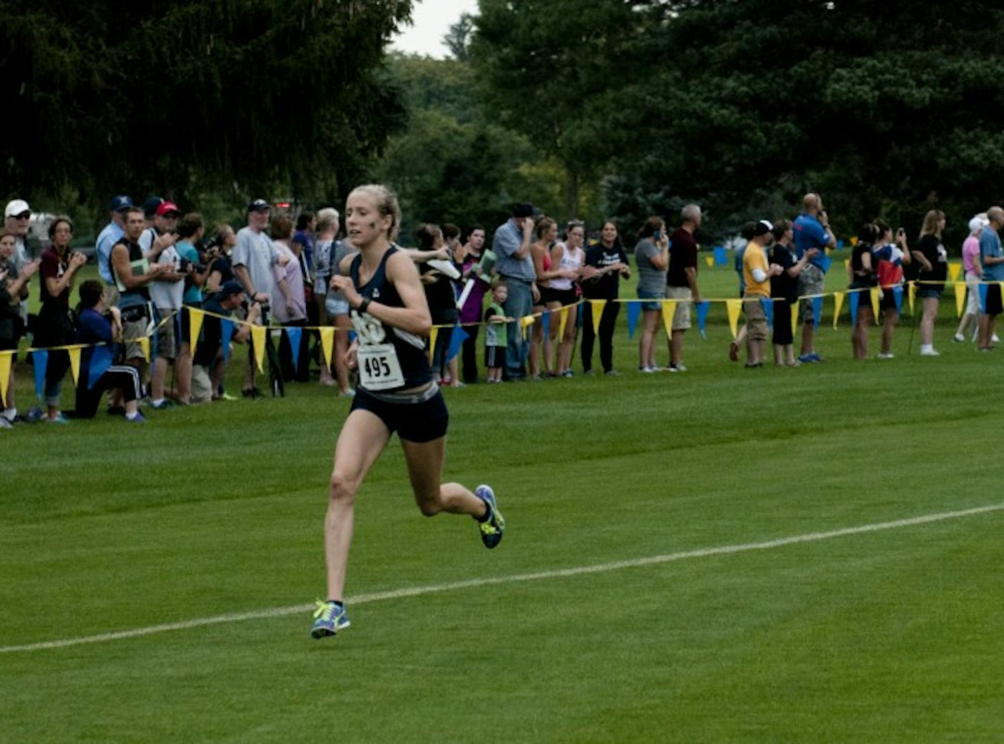 Freshman Anna Rohrer distances herself from the pack during her  first-place finish at Friday’s National Catholic Championships.