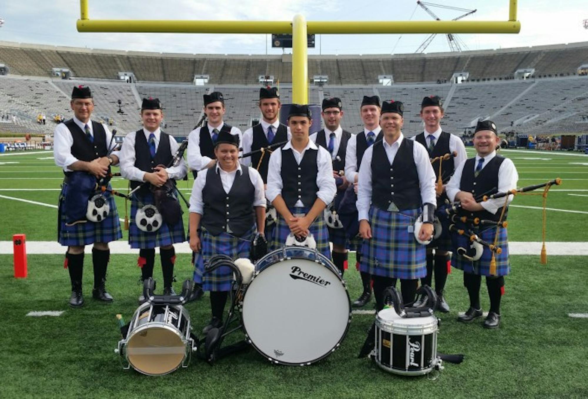 Photo courtesy of Dylan Klee  The Notre Dame Bagpipe Band poses in Notre Dame Stadium on Sept. 5 prior to the Texas game.