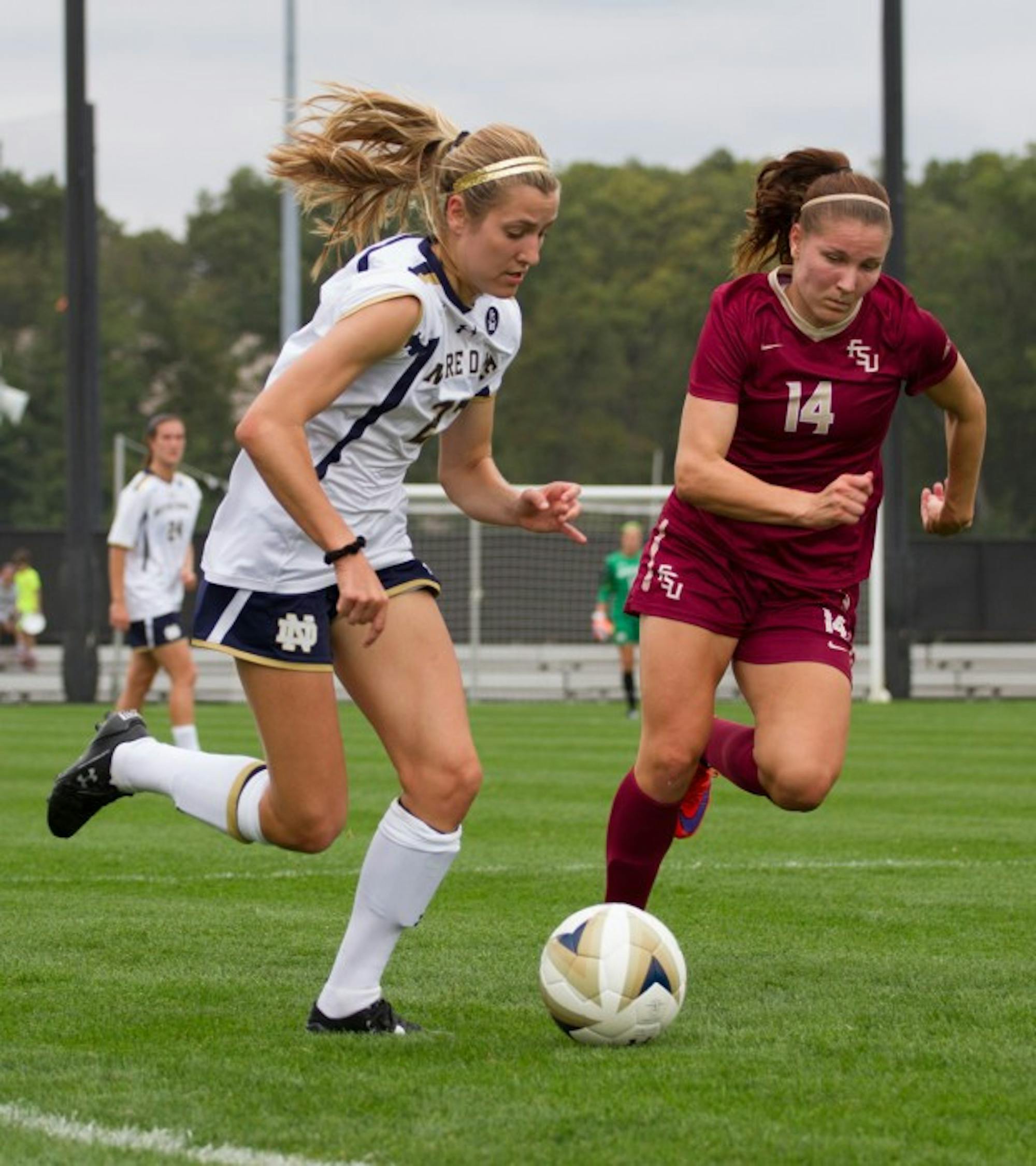 Irish sophomore defender Ginny McGowan dribbles around a defender during a 1-0 loss to Florida State on Sept. 27 at Alumni Stadium. McGowan has started in eight games this season.