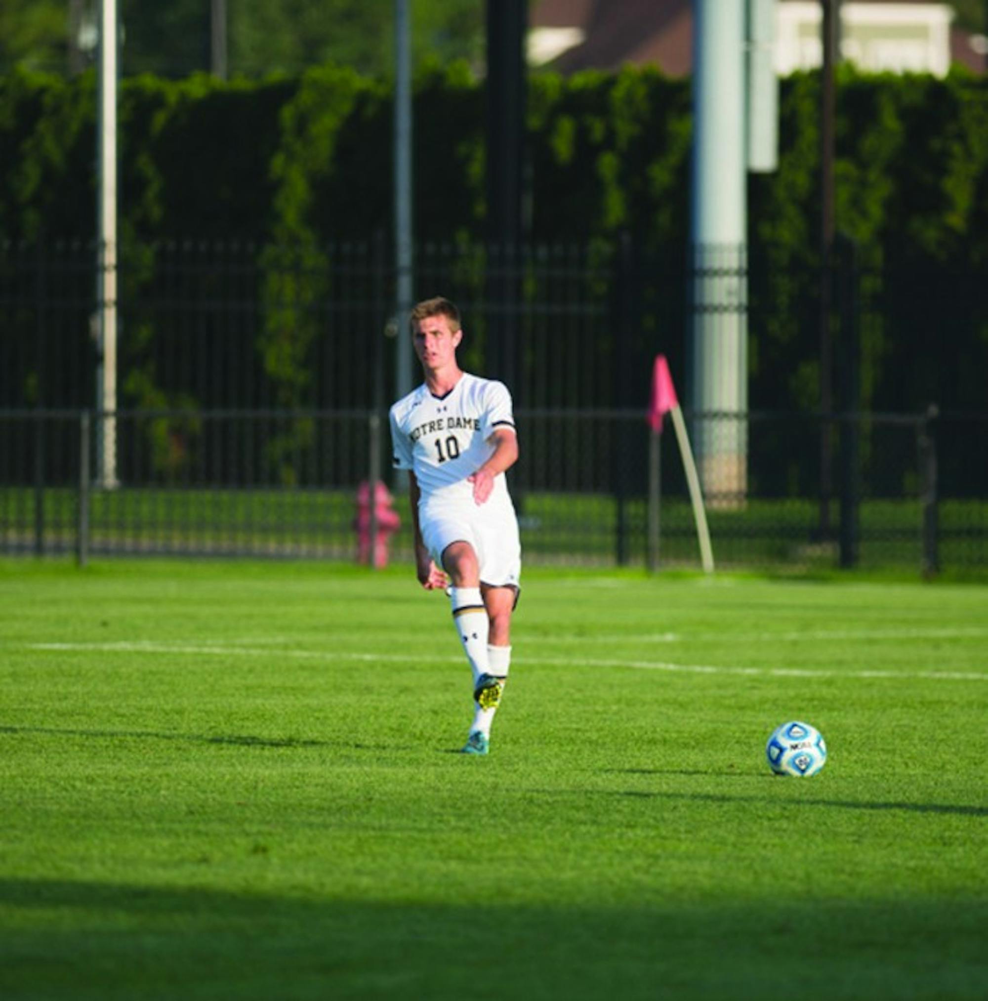 Irish sophomore defender Brandon Aubrey sends a pass in a 1-0 loss to Kentucky on Sept. 8. Aubrey has started all five matches for Notre Dame this season and has tallied one goal and three shots.