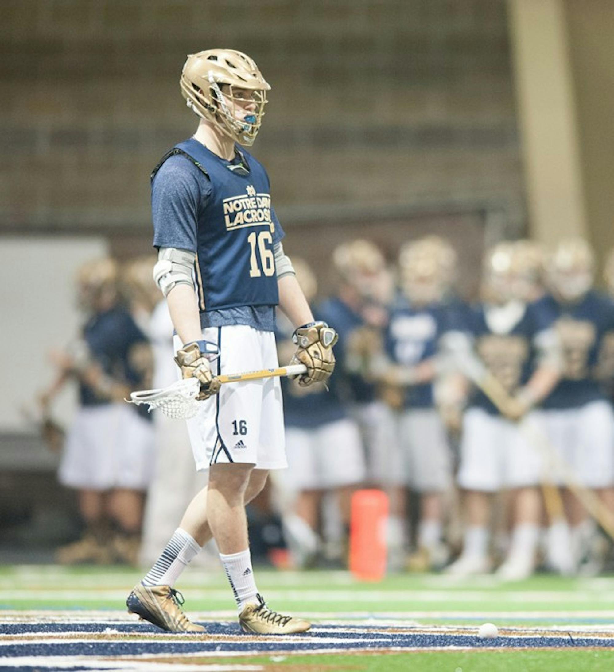 Freshman midfielder Sergio Perkovic watches game action against Detroit on Sunday at the Loftus Center. Perkovic scored three goals against Bellarmine in a contest the day before, a 12-5 Notre Dame win.