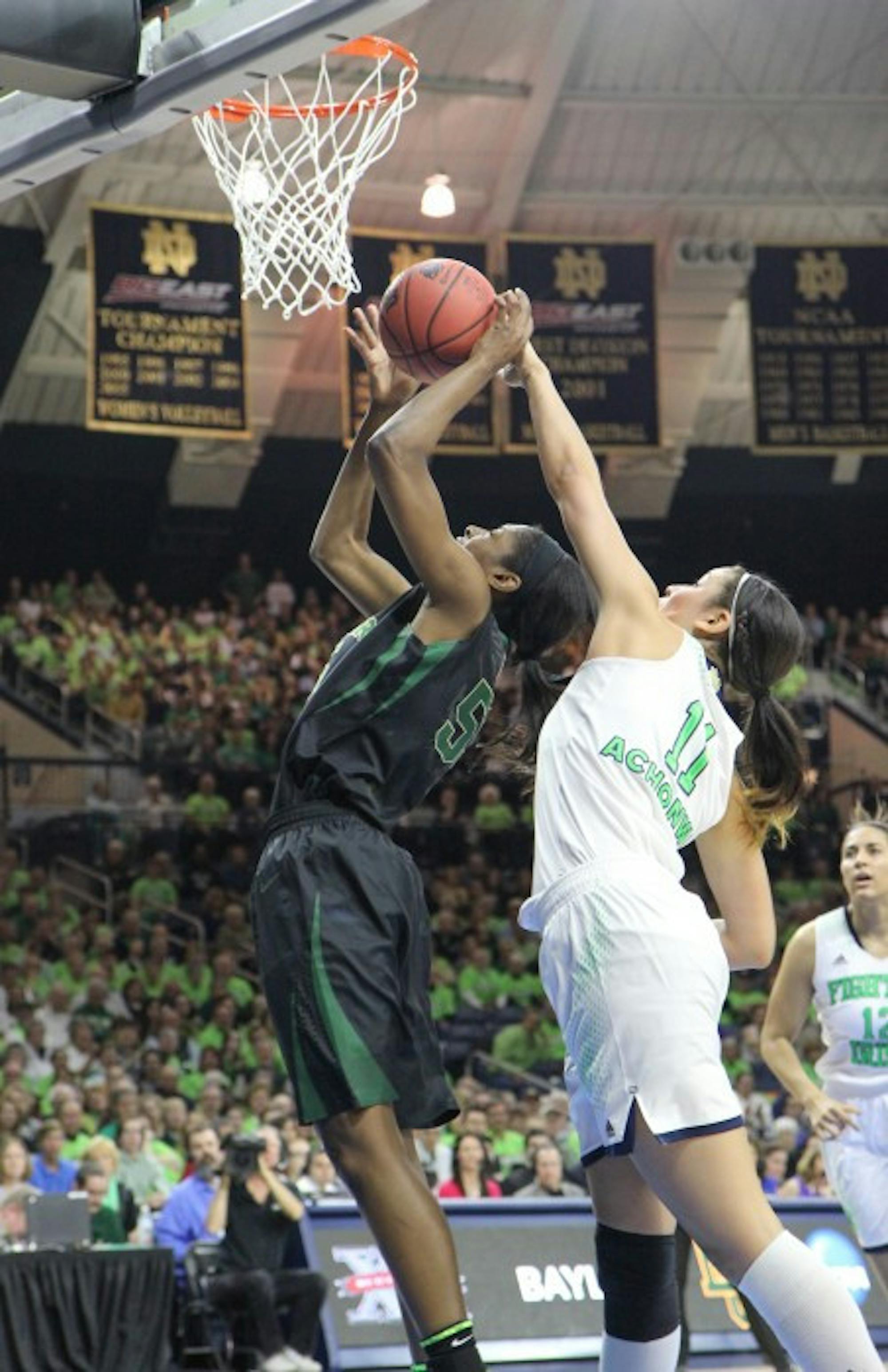 Former Irish forward Natalie Achonwa blocks a shot during Notre Dame’s 88-69 win over Baylor in the Elite Eight of the NCAA tournament on March 31, 2014.  Achonwa currently plays for the Indiana Fever.