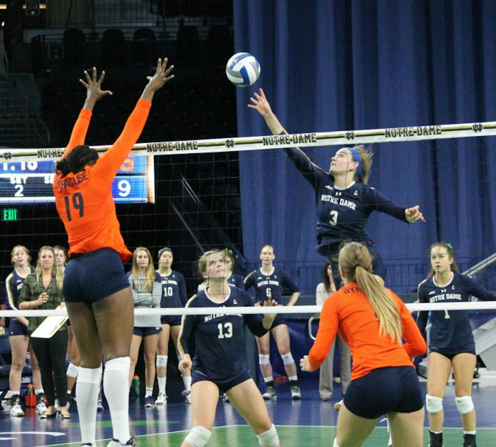 Sophomore outside hitter Sam Fry jumps to tip during Notre Dame’s loss to Syracuse on Oct. 4. Fry had 13 kills against Clemson on Friday.