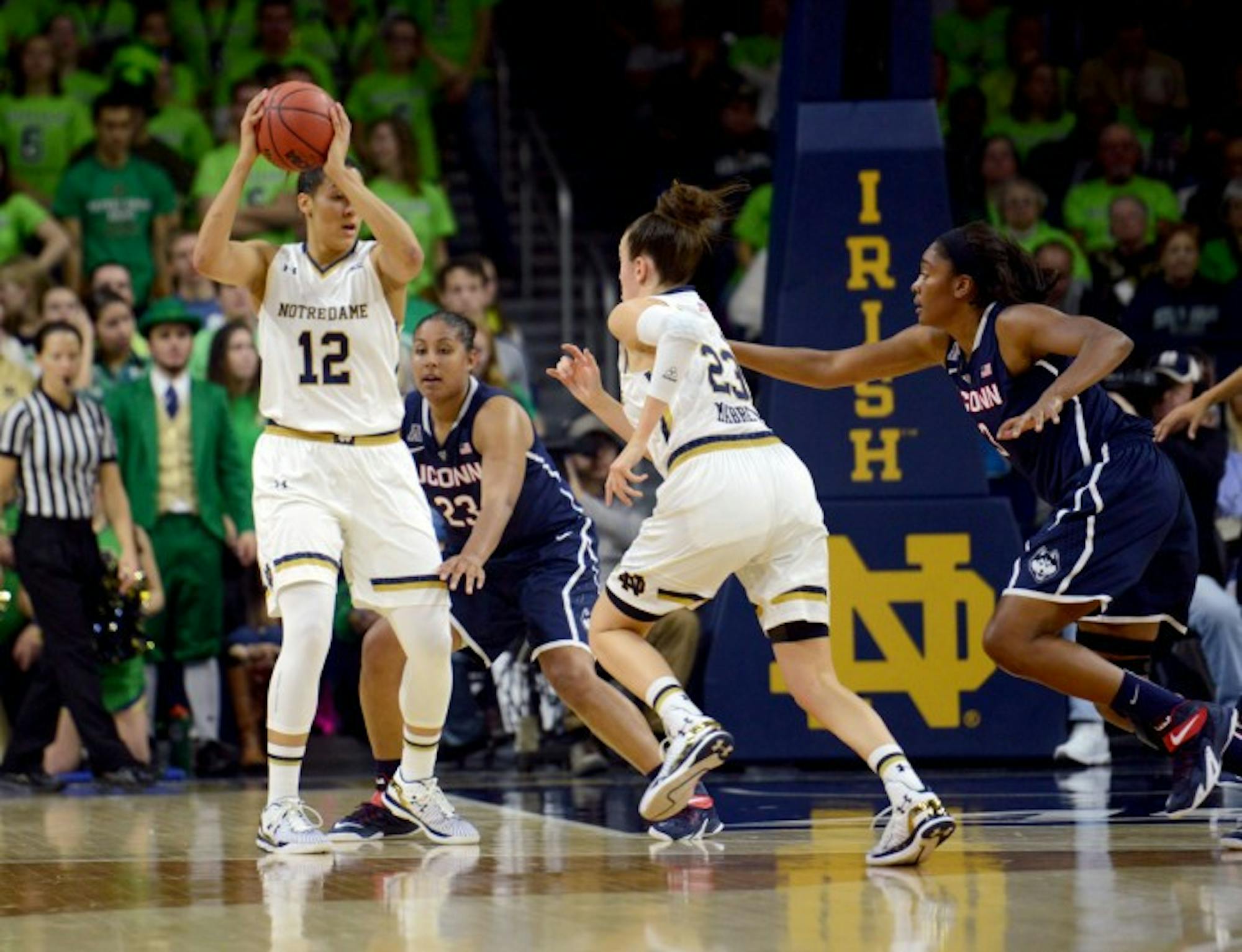 Irish sophomore forward Taya Reimer sets up to pass during Notre Dame’s 76-58 loss against Connecticut on Dec. 6 at Purcell Pavilion.