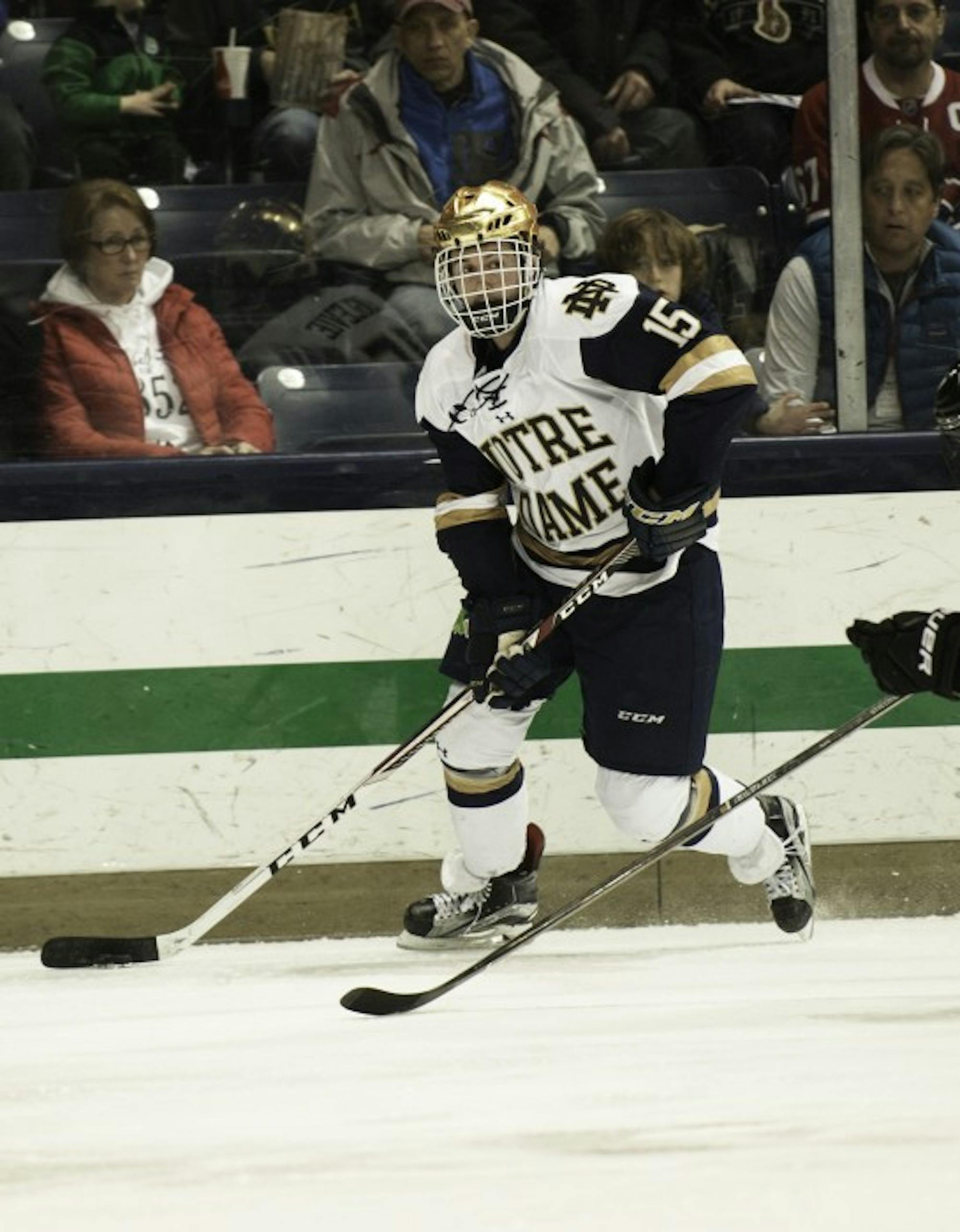 Irish sophomore forward Andrew Oglevie surveys the defense during Notre Dame’s 5-2 win over Providence on March 11.