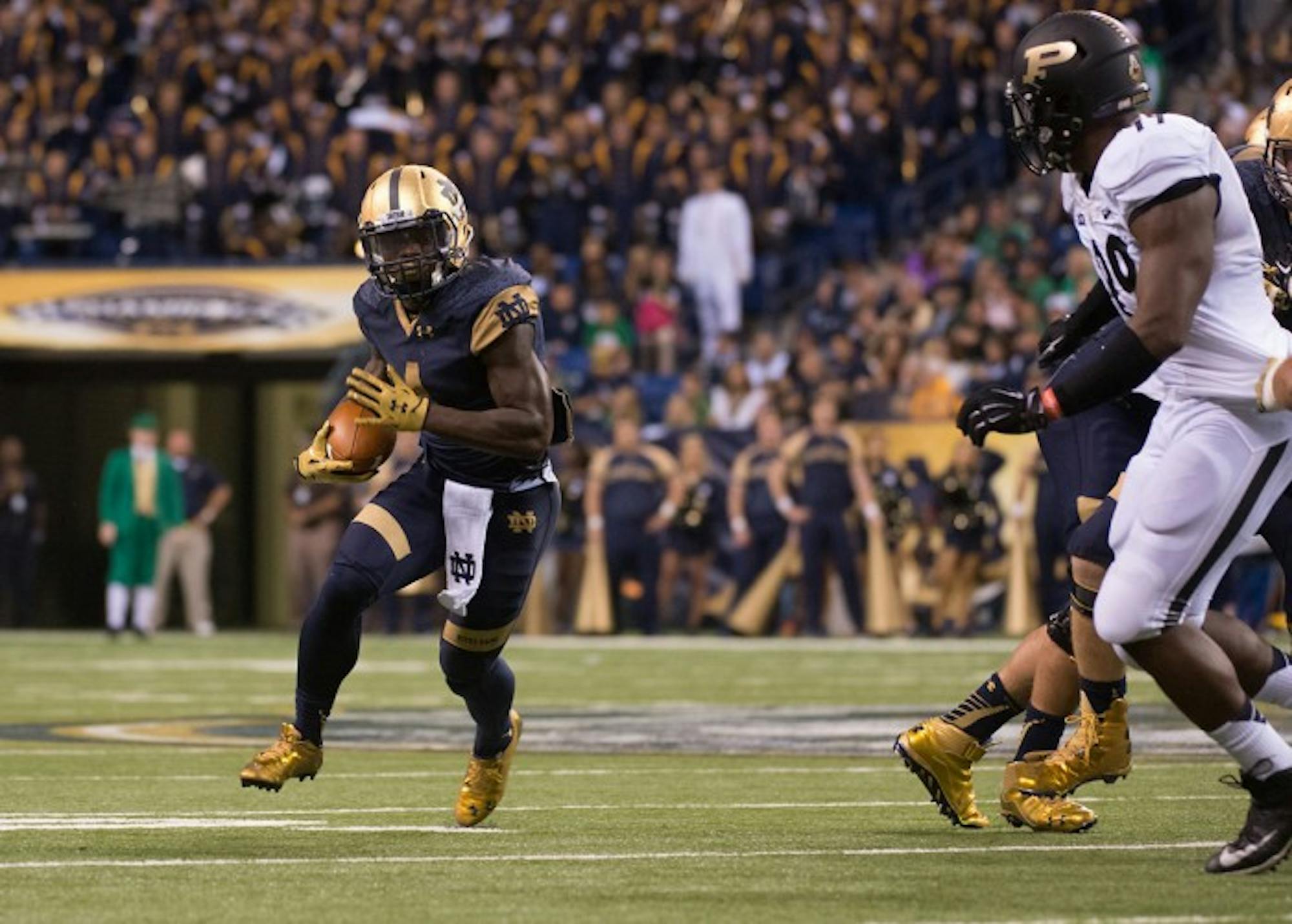 Sophomore running back Greg Bryant carries the ball in the 30-14 win against Purdue at Lucas Oil Stadium on Saturday that gave Notre Dame a 3-0 record.