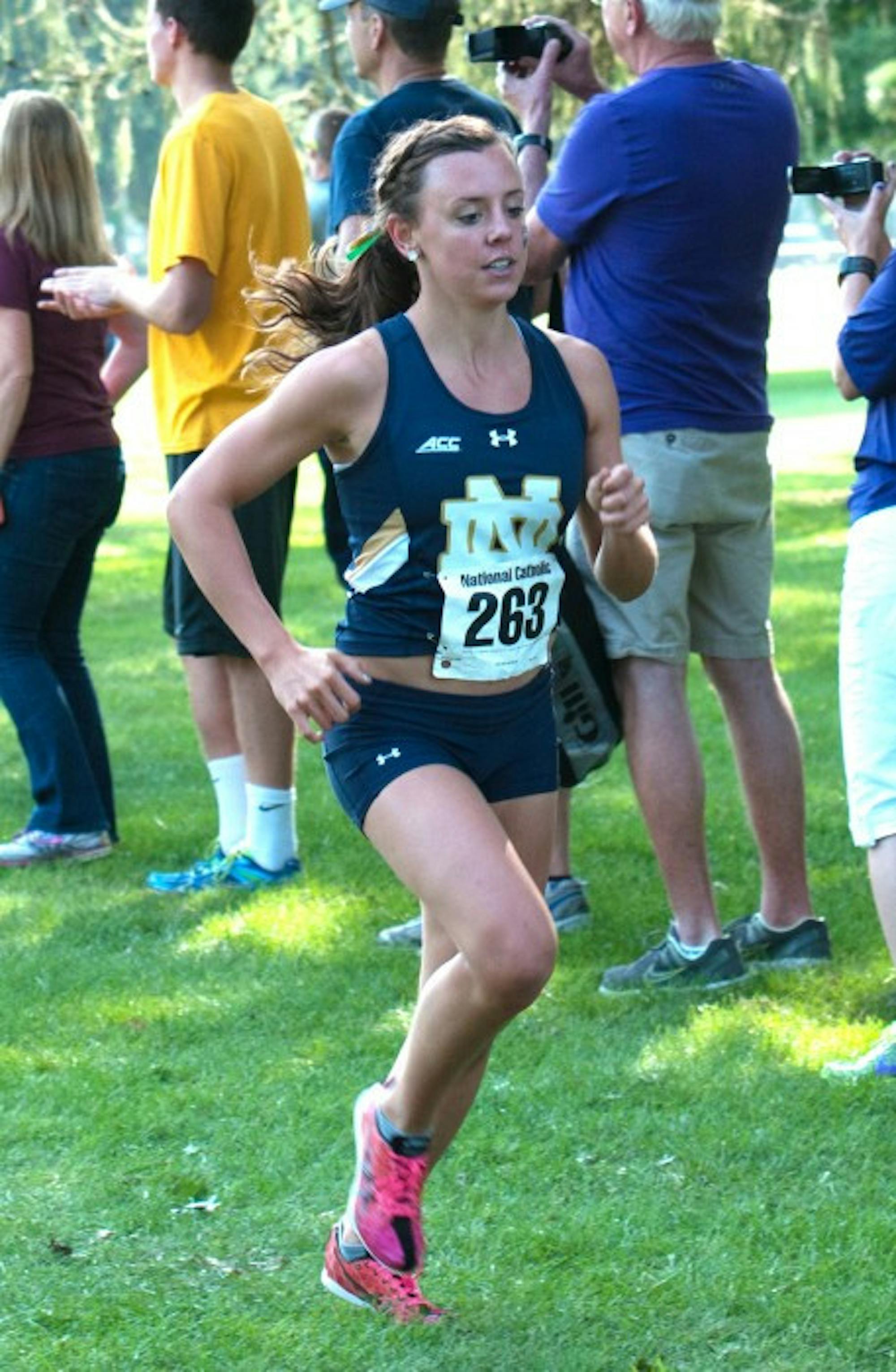 Irish graduate student Sydni Meunier begins her 5k race during the National Catholic Championship at Notre Dame on Sep. 19 during the 2014 season. Munier finished 7th overall out of the field of 91 runners.